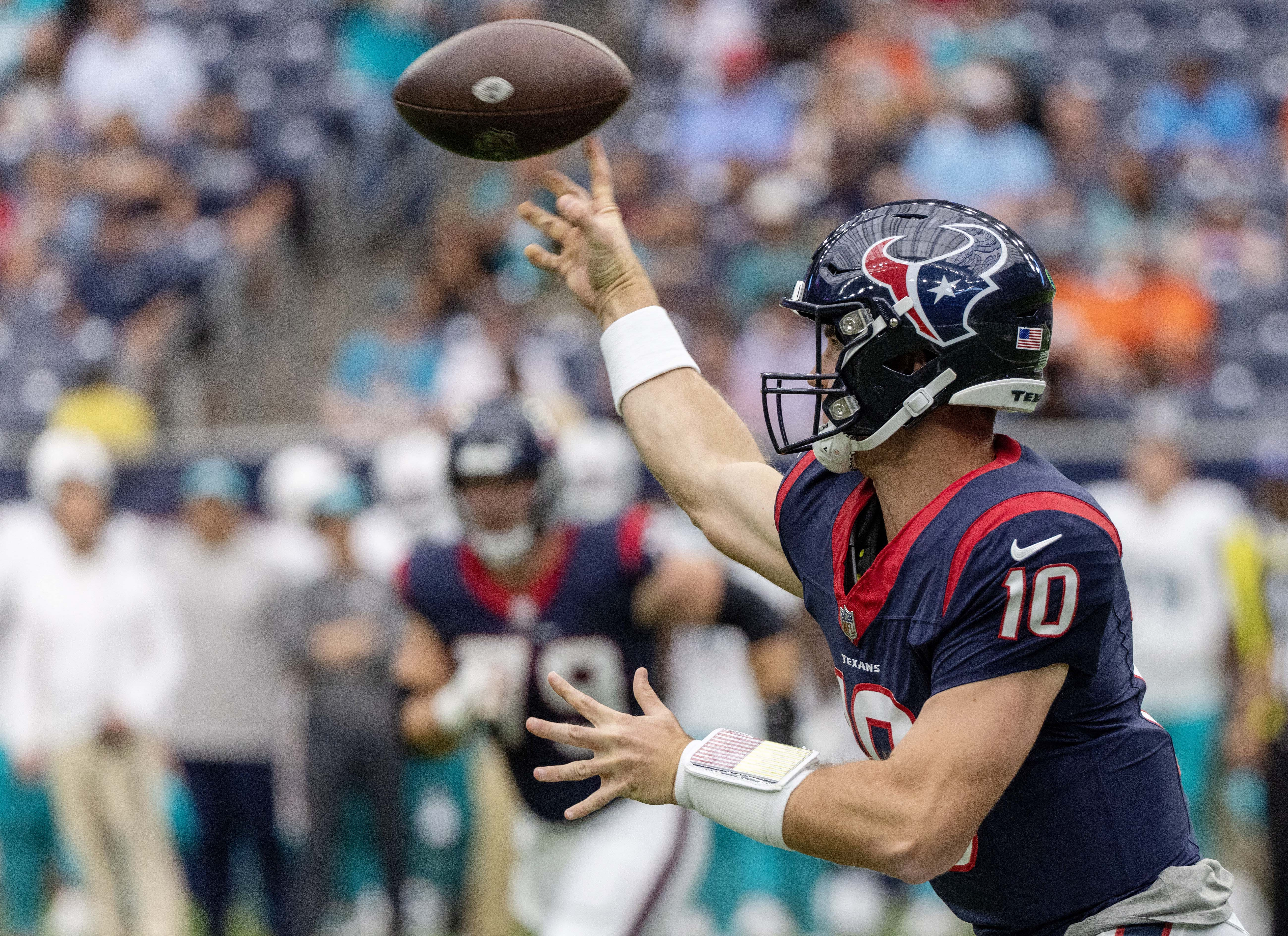 Miami. FL USA; Miami Dolphins quarterback Skylar Thompson (19) rolls out of  the pocket during an NFL game against the Houston Texans at the Hard Rock  Stadium, Sunday, November 27. The Dolphins