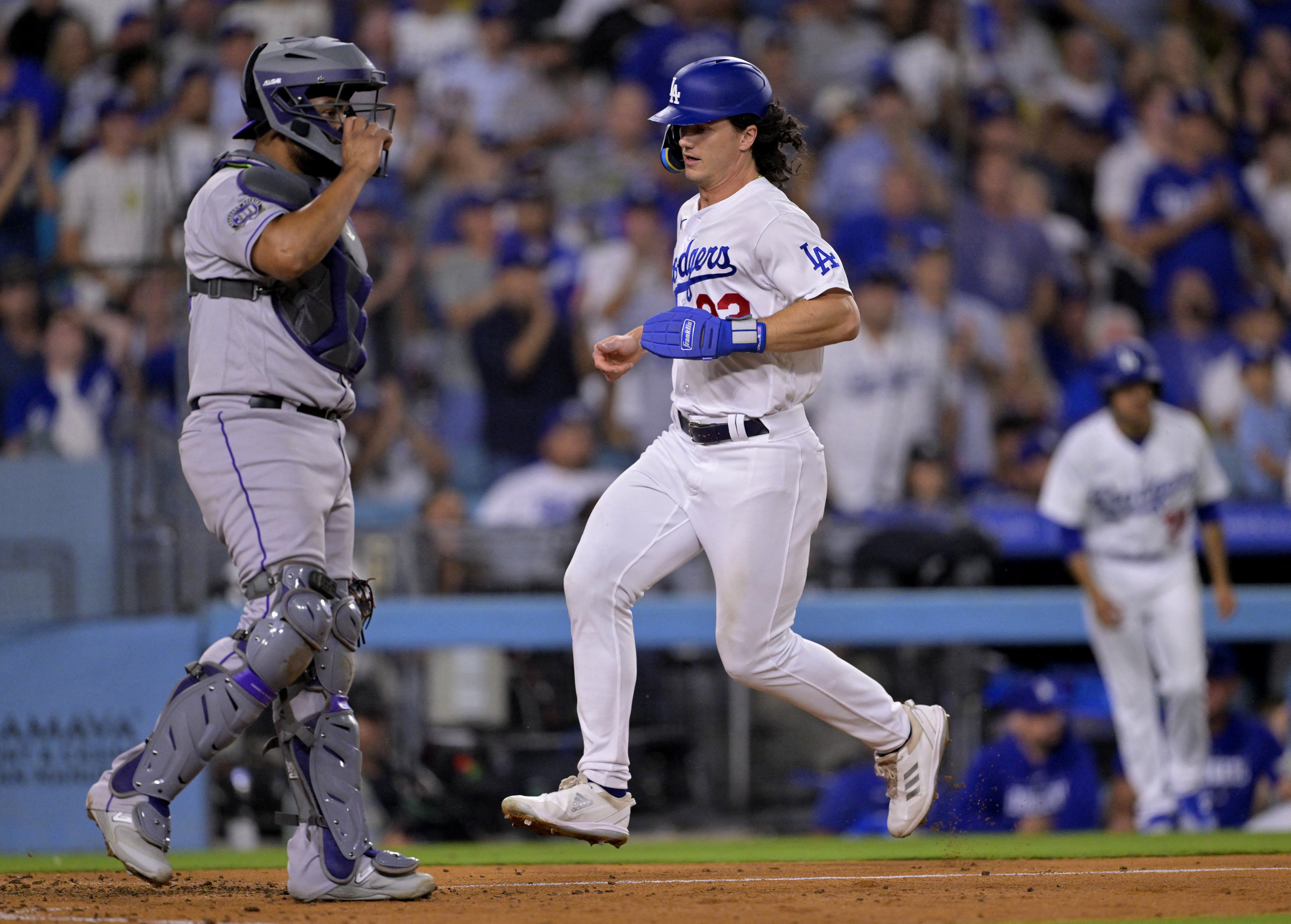 Dodgers use four-run sixth to tame Rockies, 6-1