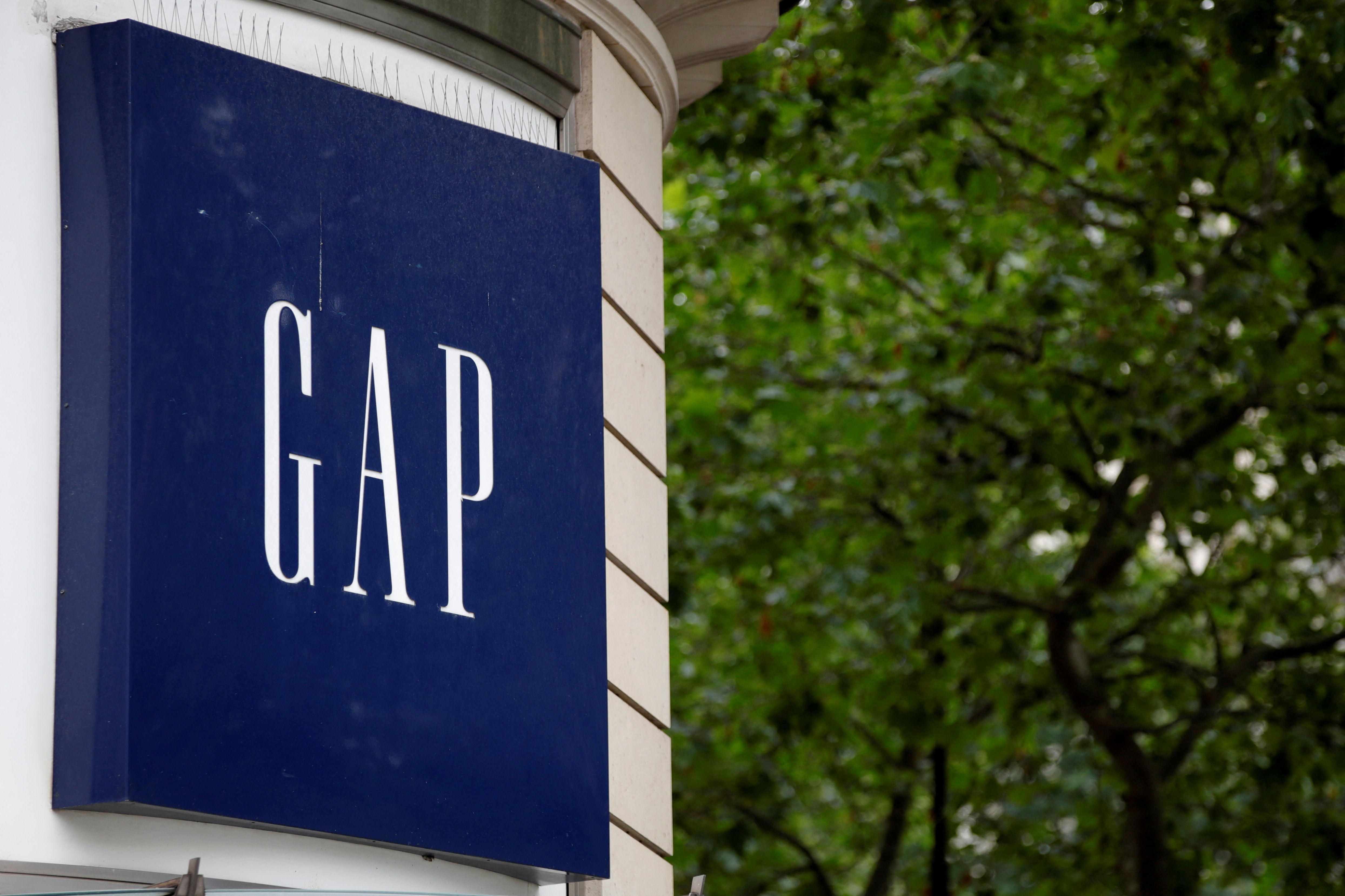 The Gap logo is seen on the front of a store in Paris