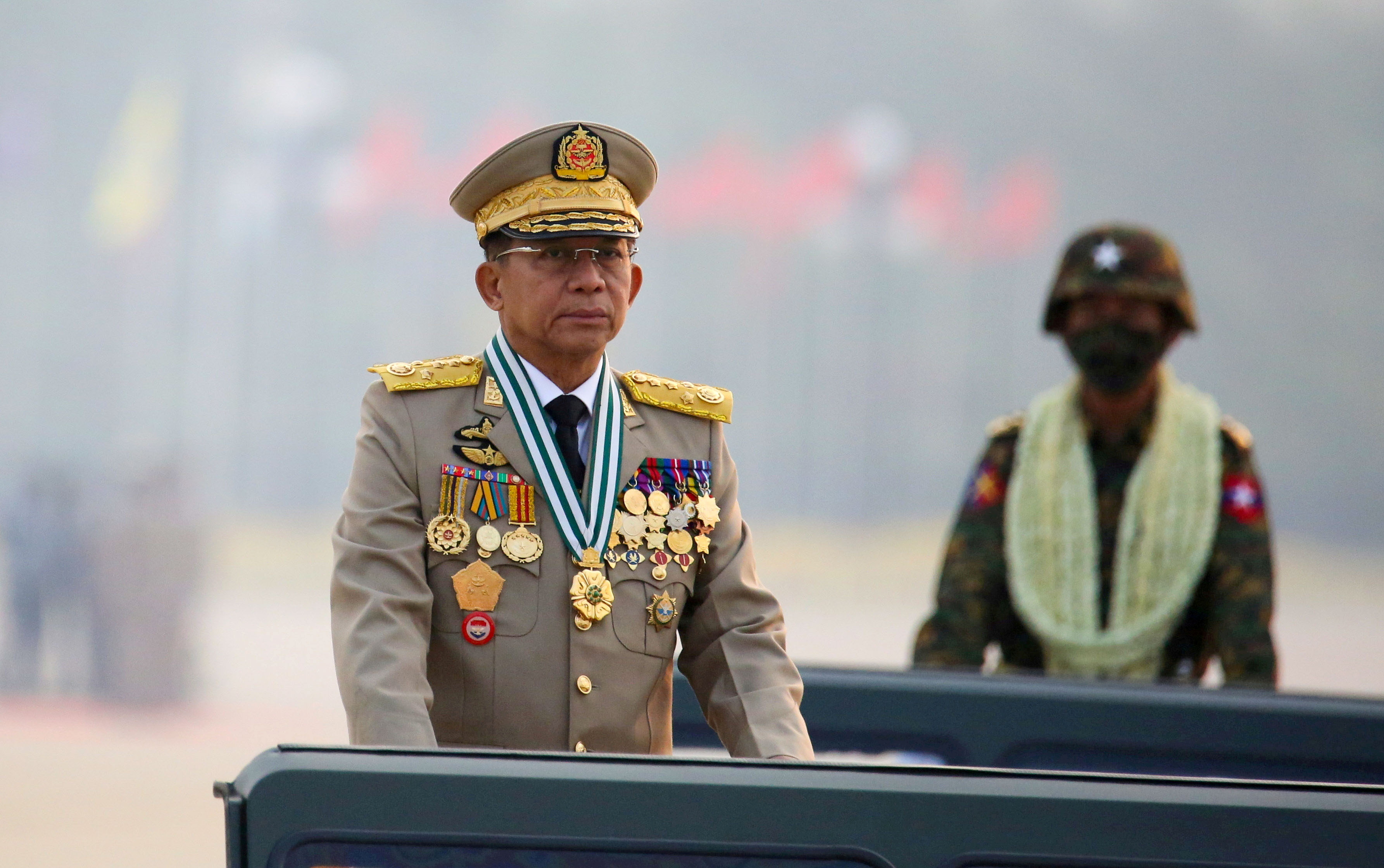 Myanmar's military ruler Min Aung Hlaing presides over an army parade on Armed Forces Day in Naypyitaw, Myanmar, March 27, 2021. REUTERS/Stringer 