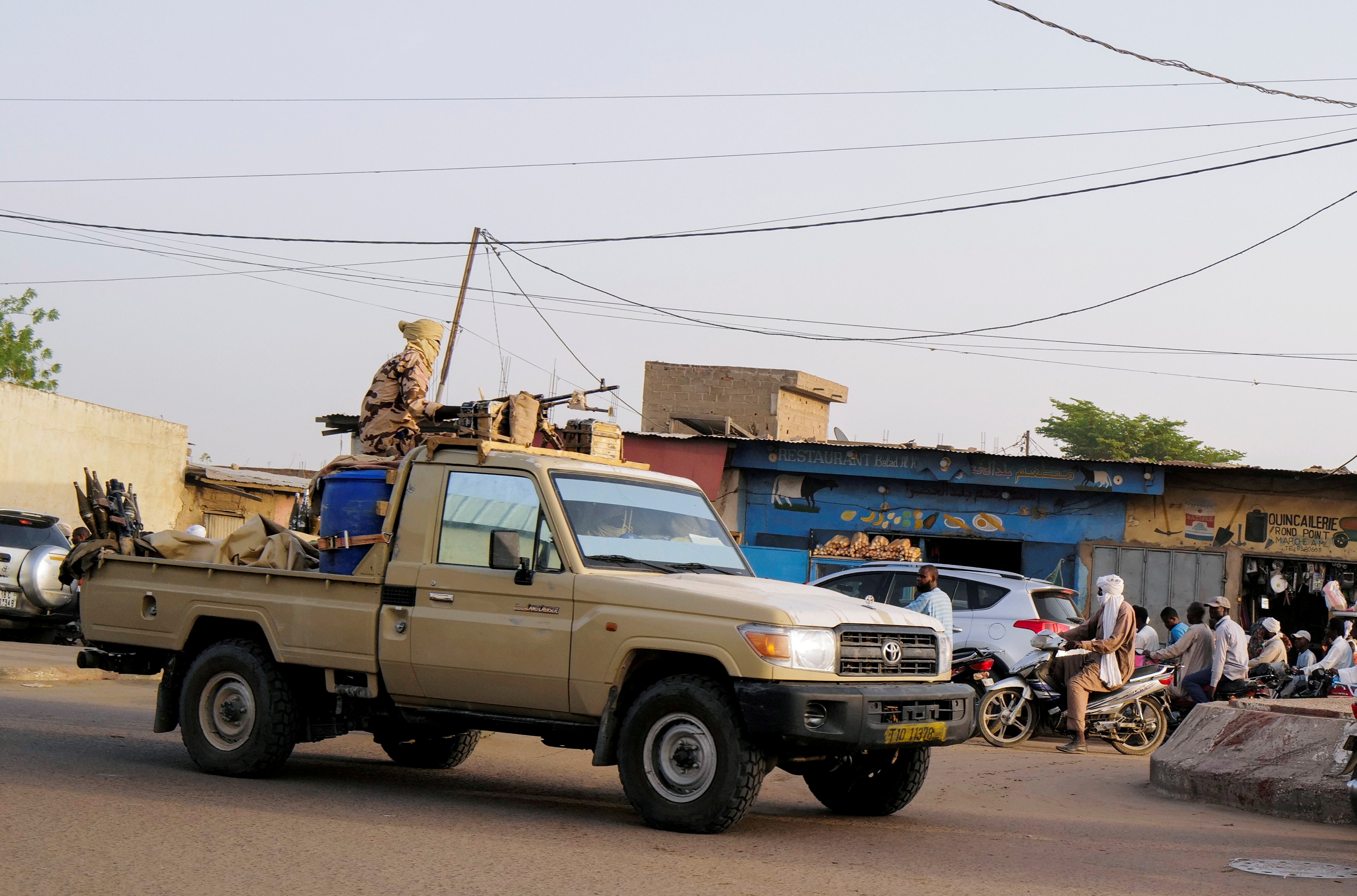 Members of the security forces patrol Chad's capital N'Djamena following the battlefield death of President Idriss Deby in N'Djamena