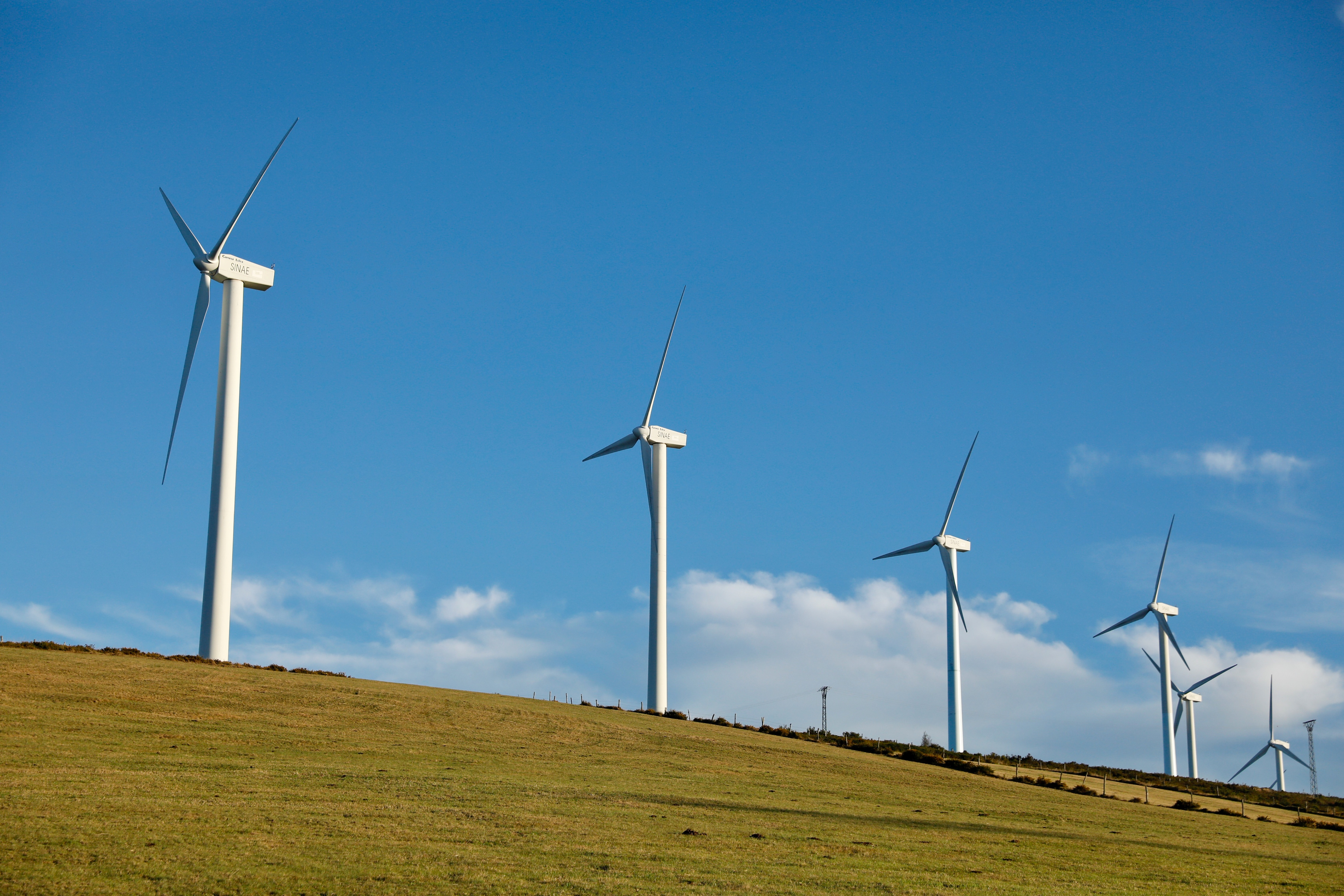 Wind turbines used to generate electricity are seen near the village of La Mesa