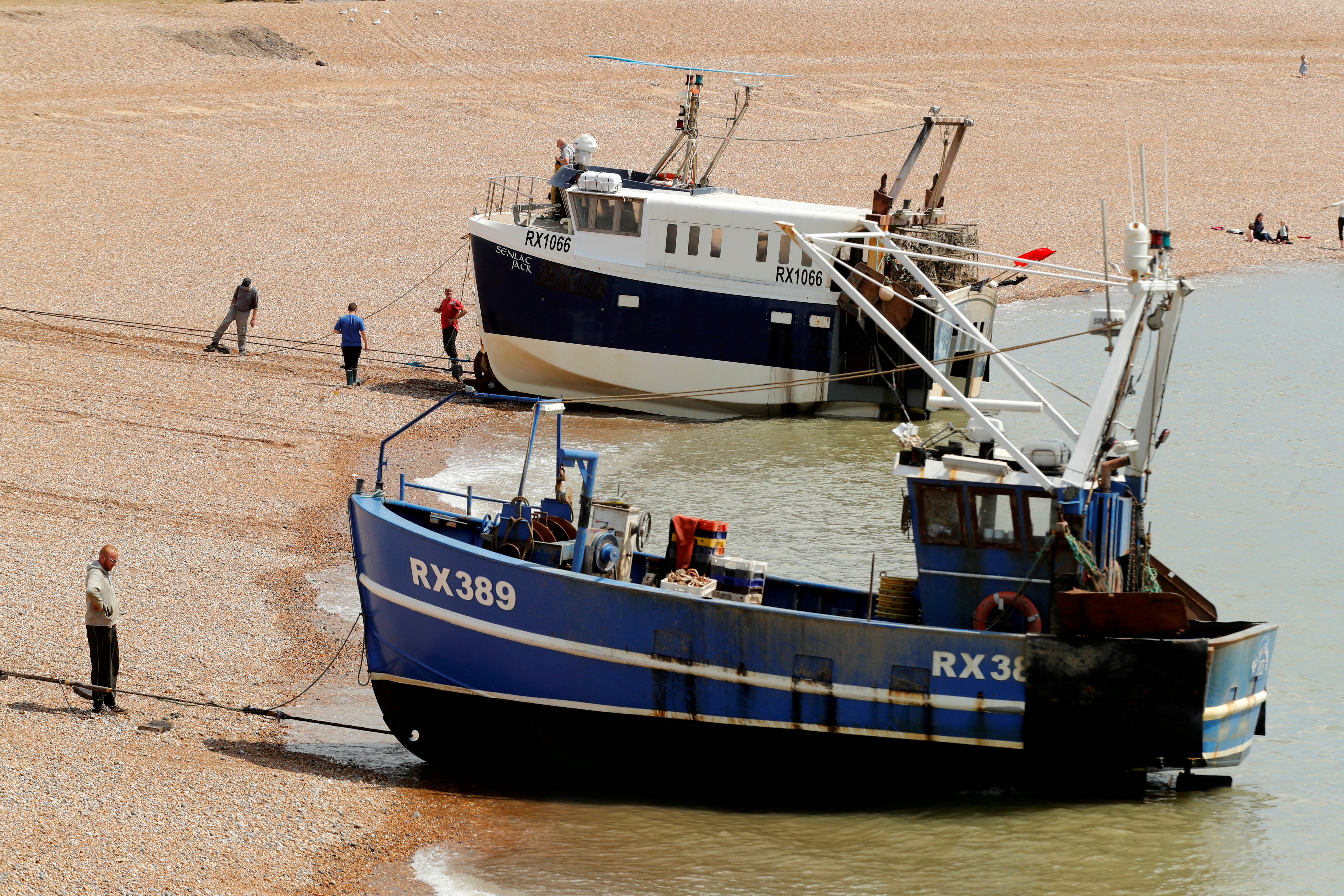 Fishing boats and fisherman in Hastings