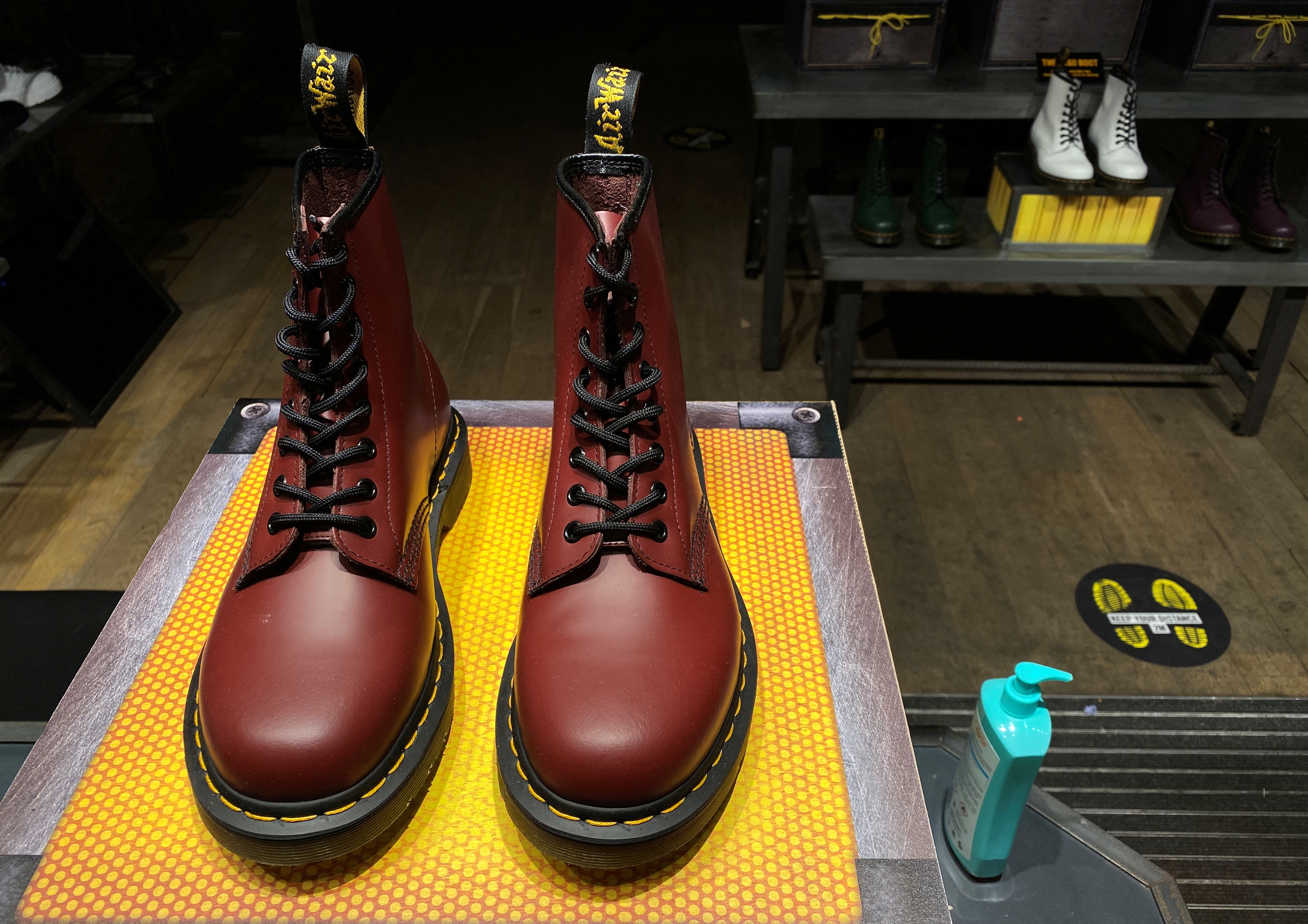 gereedschap buffet Intentie Dr Martens' acid-proof boots also resist inflation | Reuters