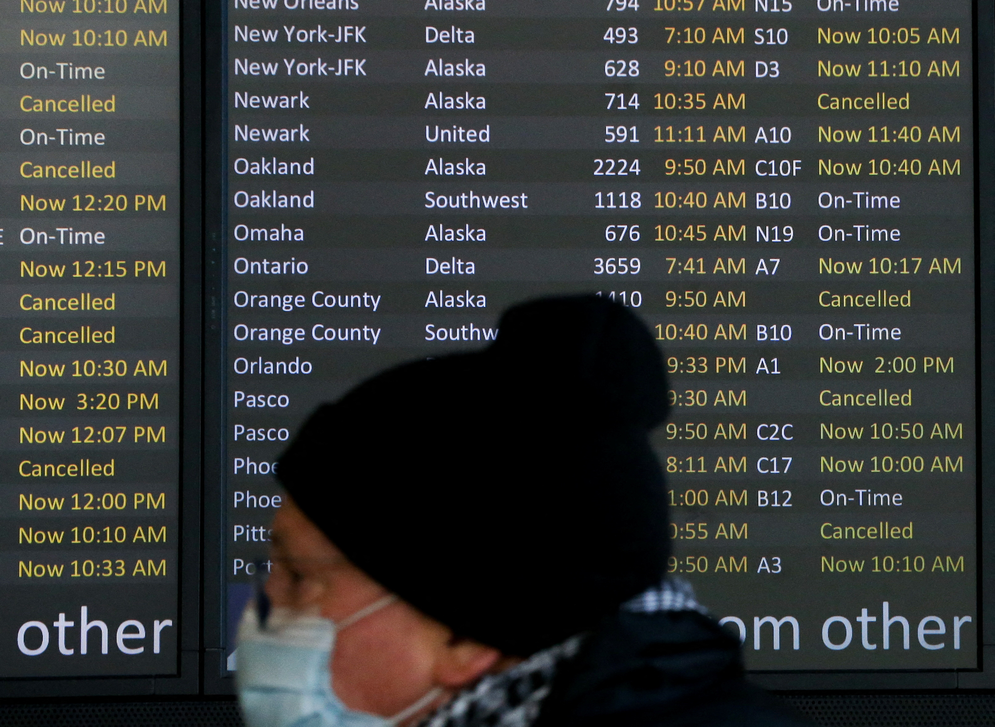 Dozens of flights listed as cancelled or delayed at Seattle-Tacoma International Airport