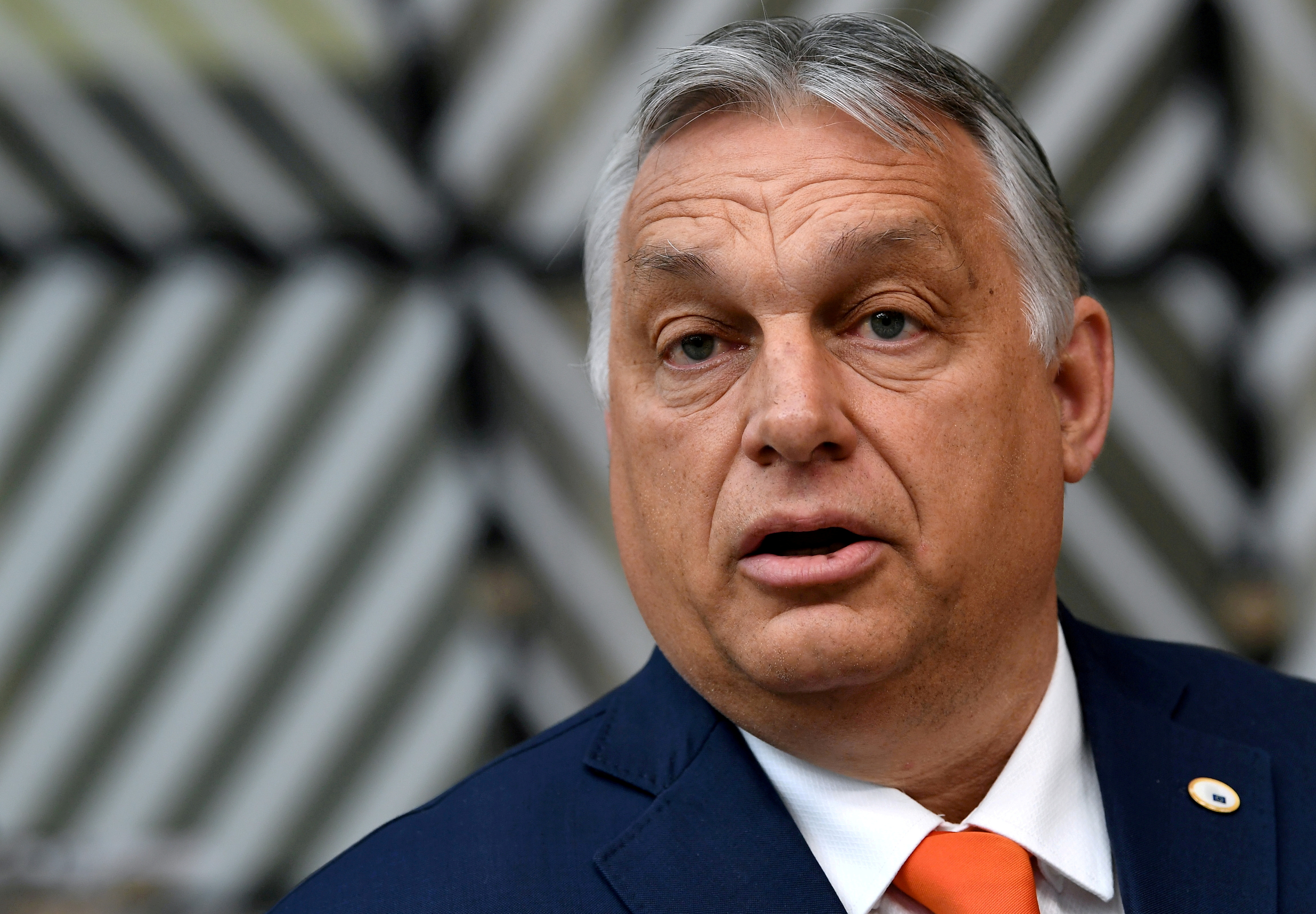 Hungary's Prime Minister Viktor Orban addresses the media as he arrives on the first day of the European Union summit at The European Council Building in Brussels, Belgium June 24, 2021.