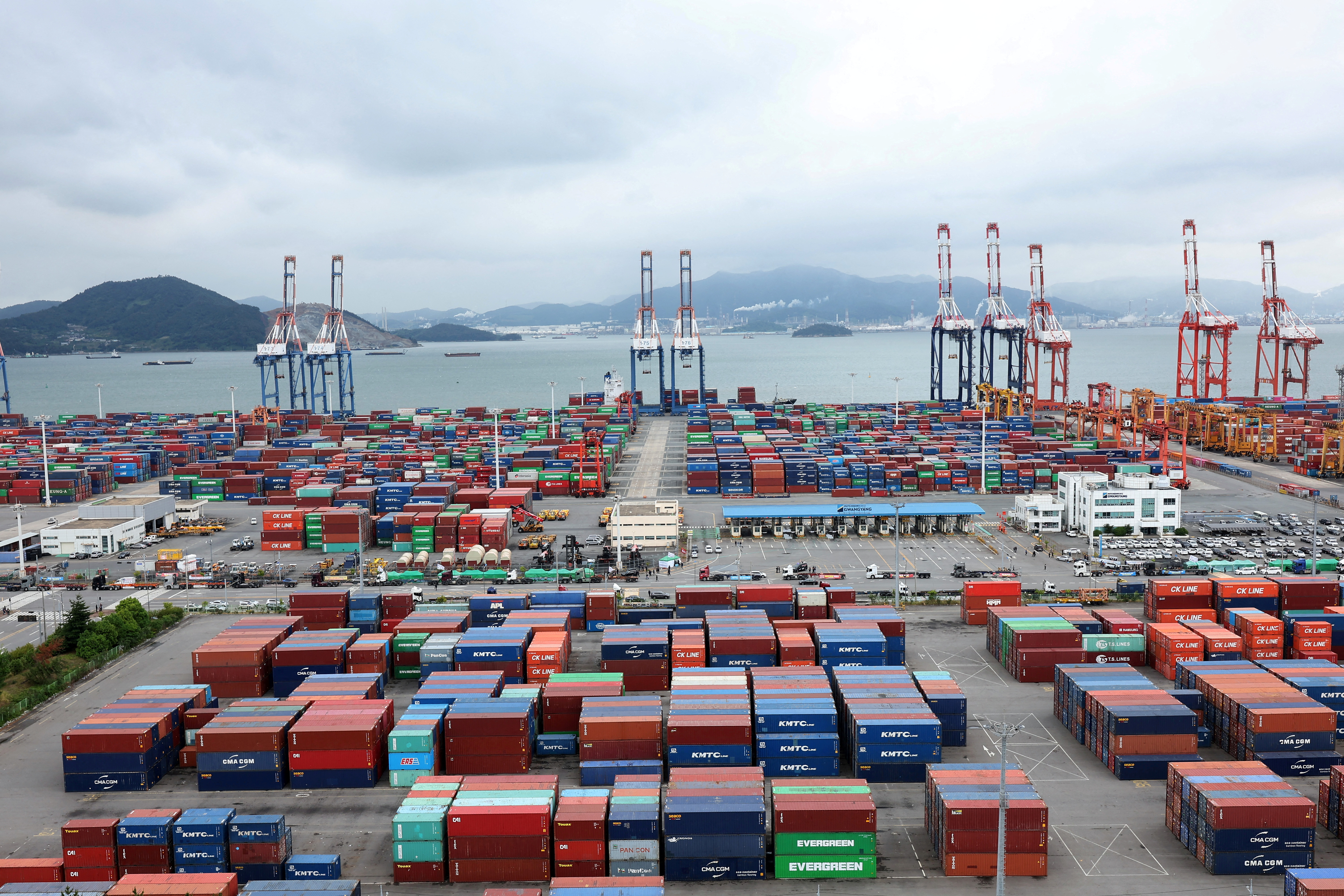 FILE PHOTO: Shipping containers are stacked at Gwangyang port, in Gwangyang