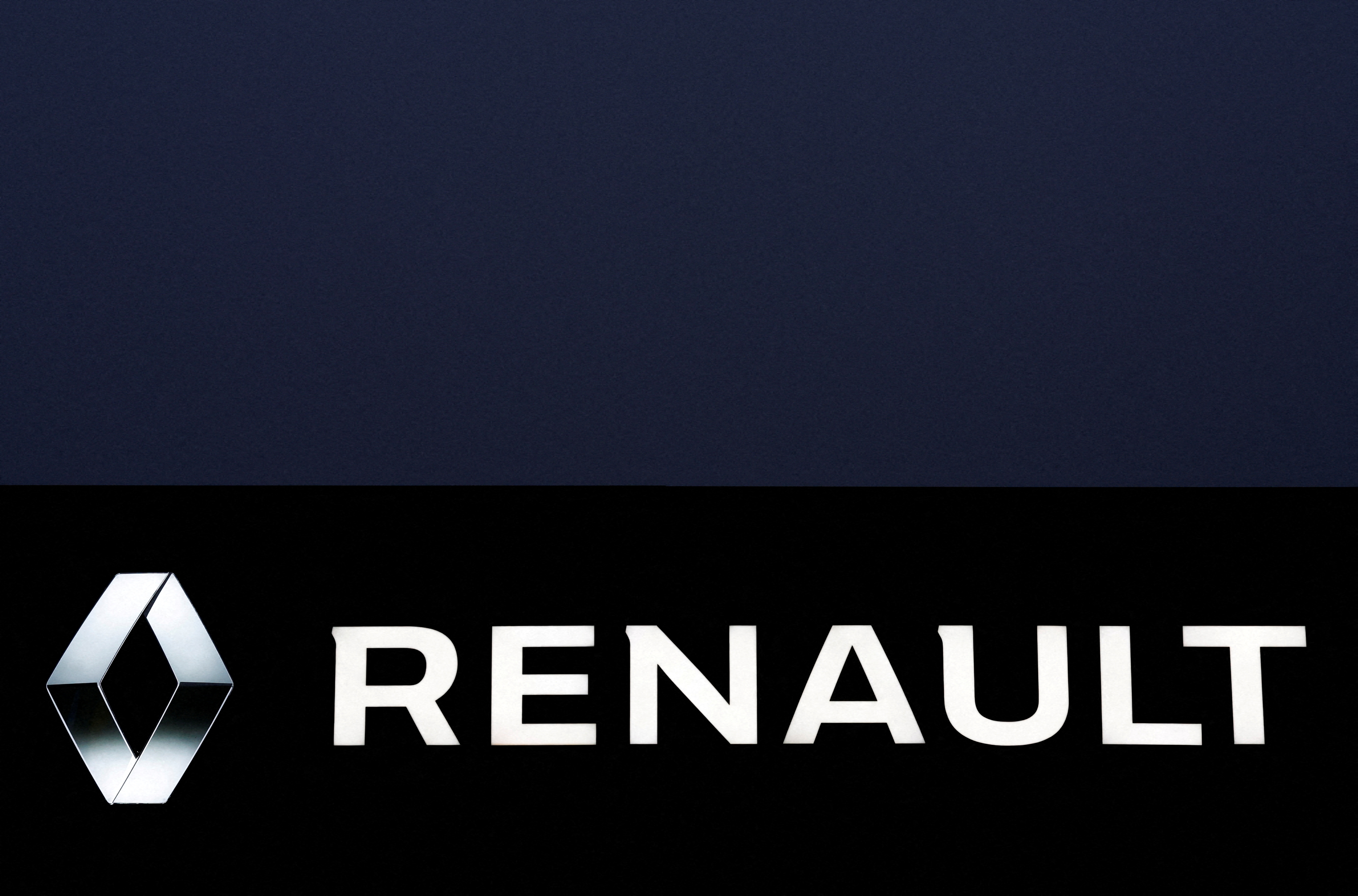 The logo of Renault carmaker is pictured at a dealership in Vertou