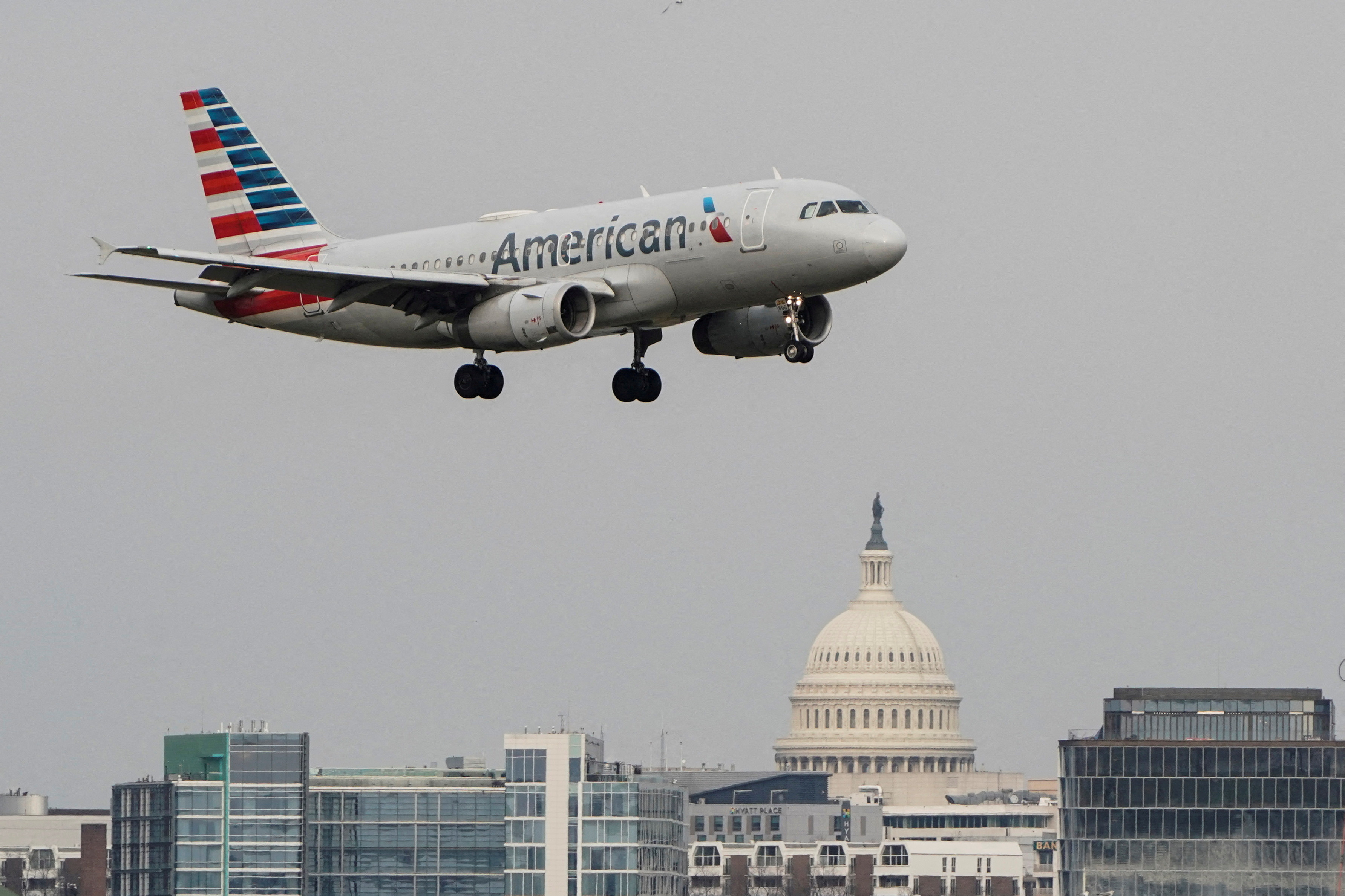 An American Airlines aircraft lands at Reagan National Airport in Arlington, Virginia