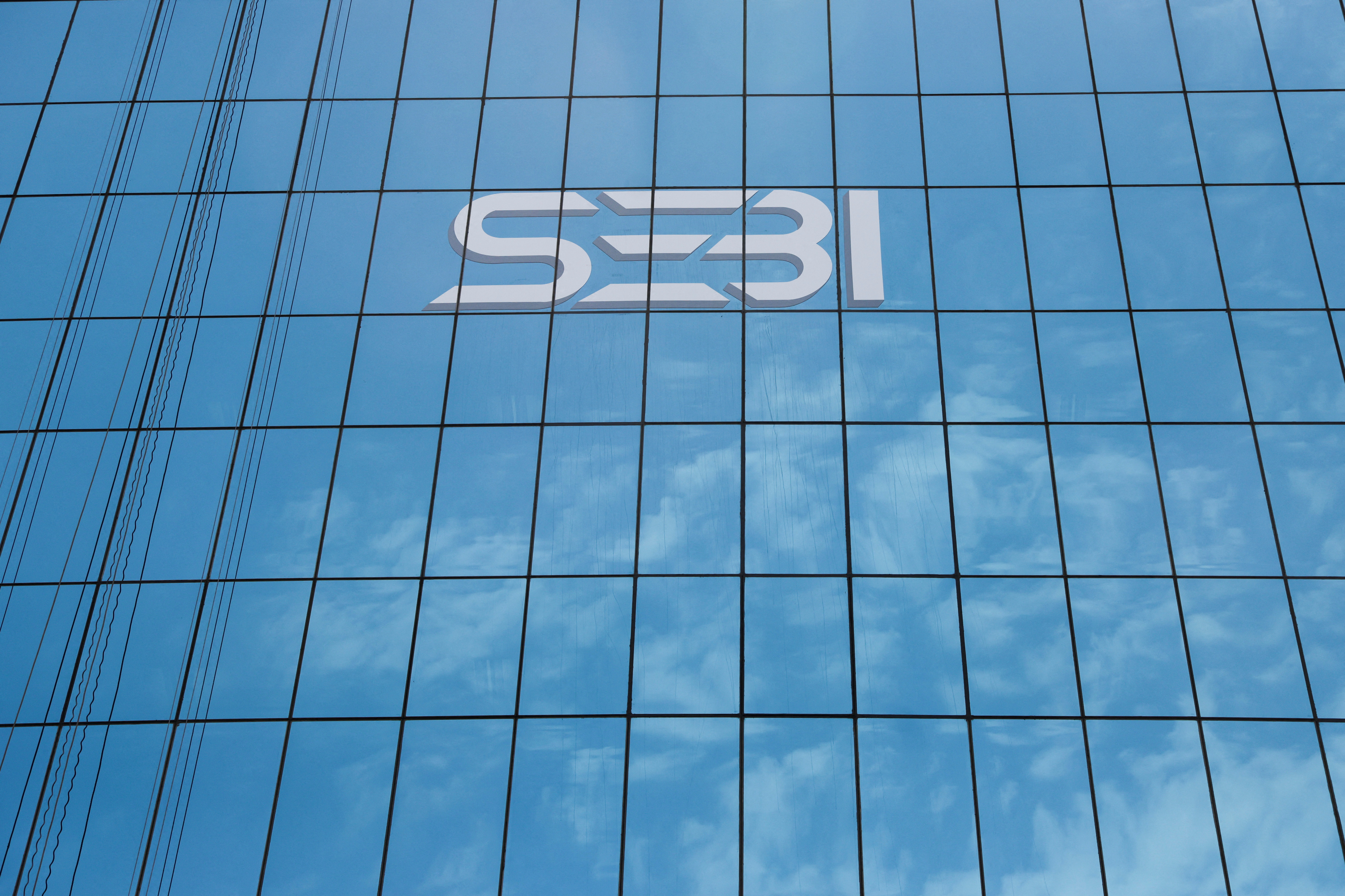 The new logo of the Securities and Exchange Board of India (SEBI) is seen on the facade of its headquarters in Mumbai,