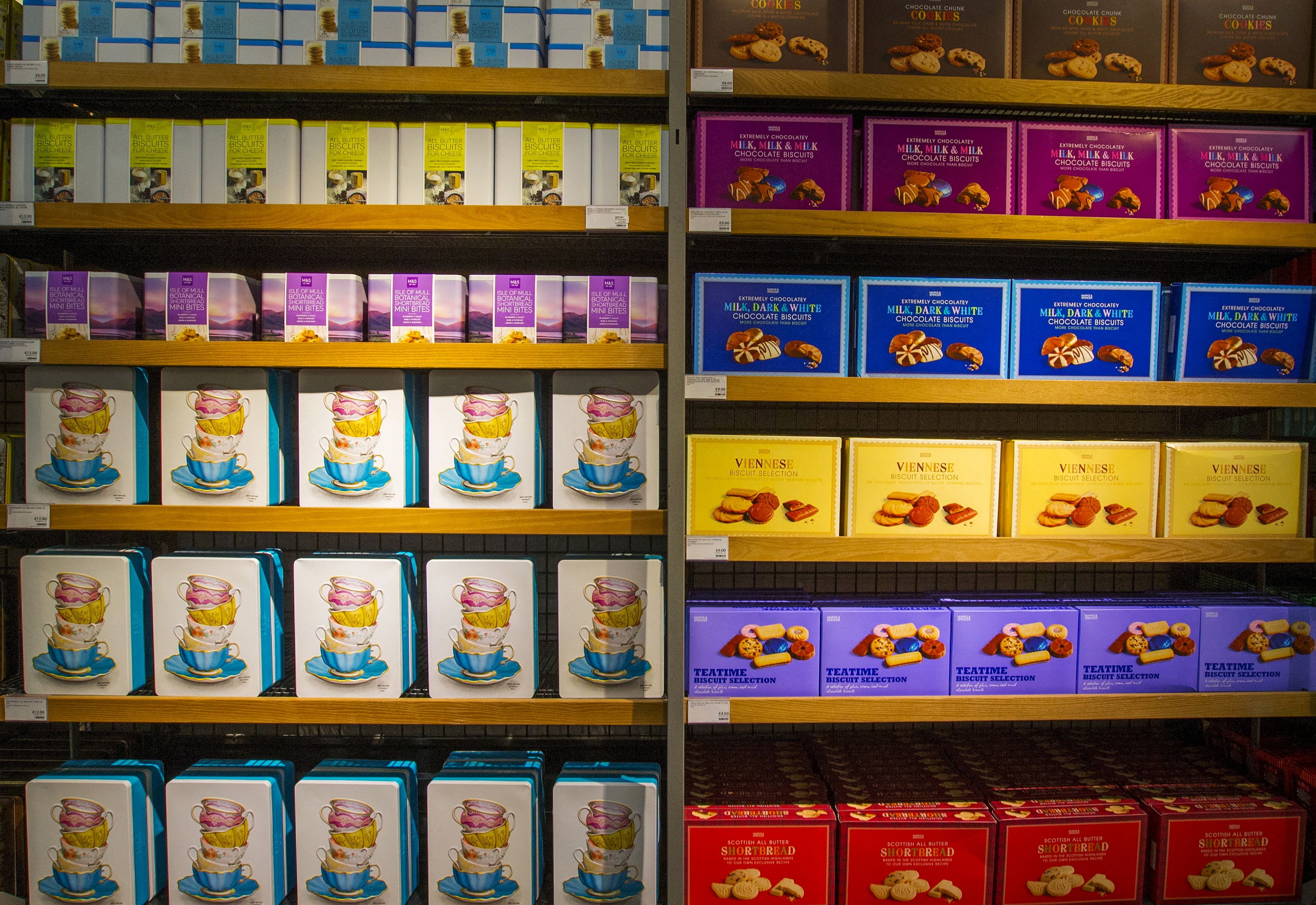 Boxes of biscuits boxes are seen in the food department at a Marks & Spencer store in Brussels