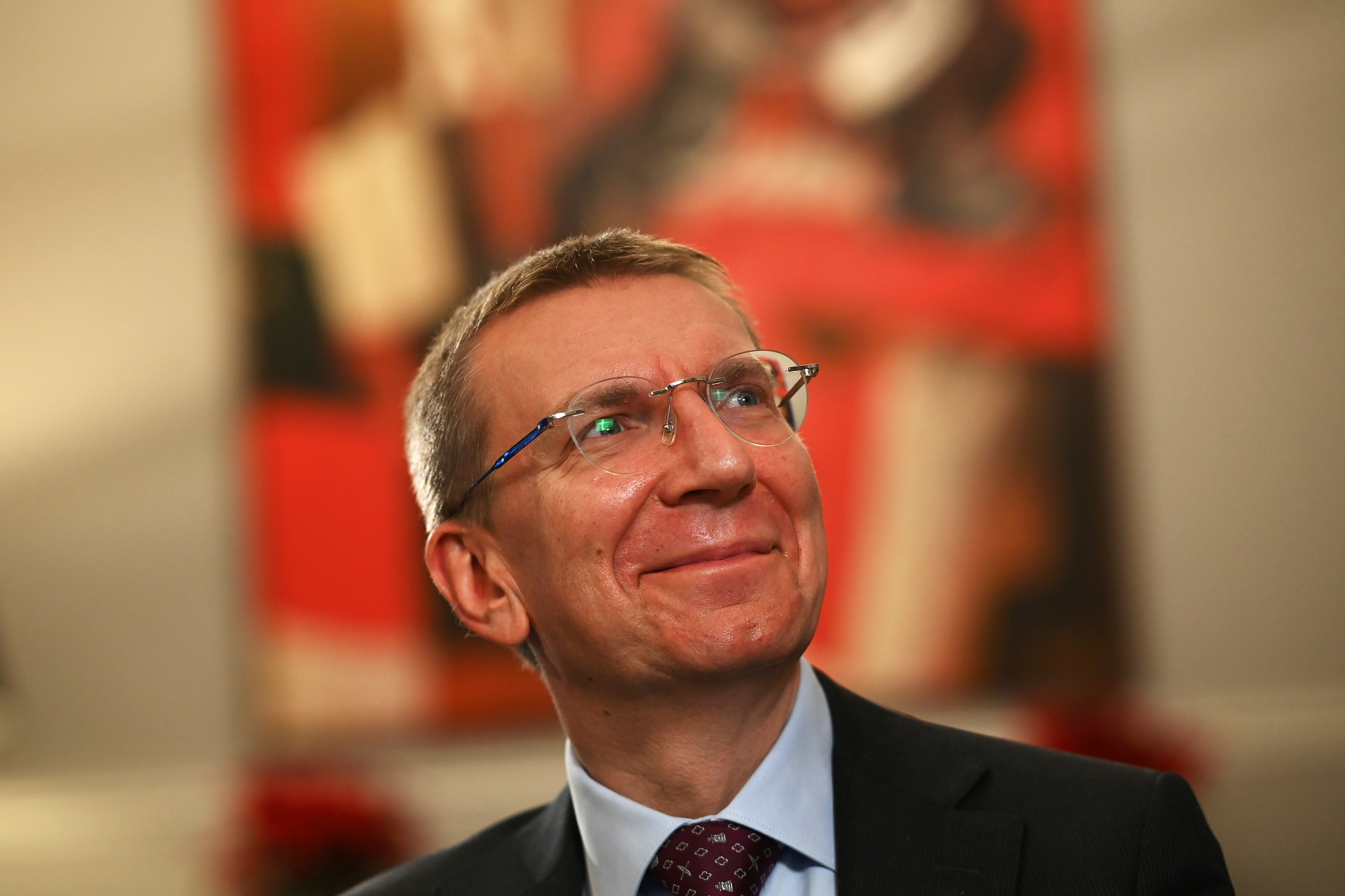 Latvian Foreign Minister Edgars Rinkevics smiles during an interview with Reuters at the Latvian Embassy in London, Britain, December 7, 2021. REUTERS/Dylan Martinez
