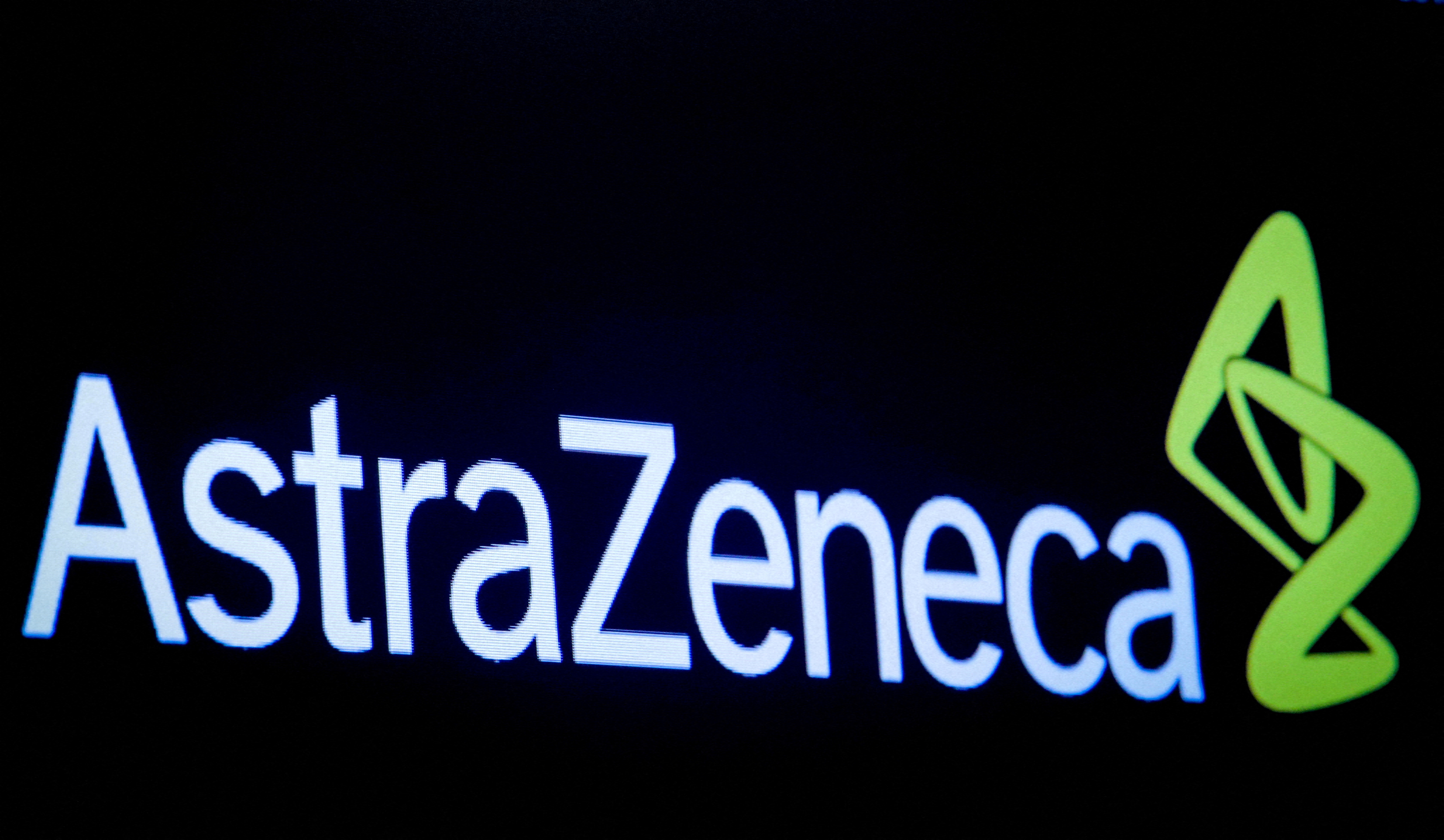 The company logo for pharmaceutical company AstraZeneca is displayed on a screen on the floor at the NYSE in New York