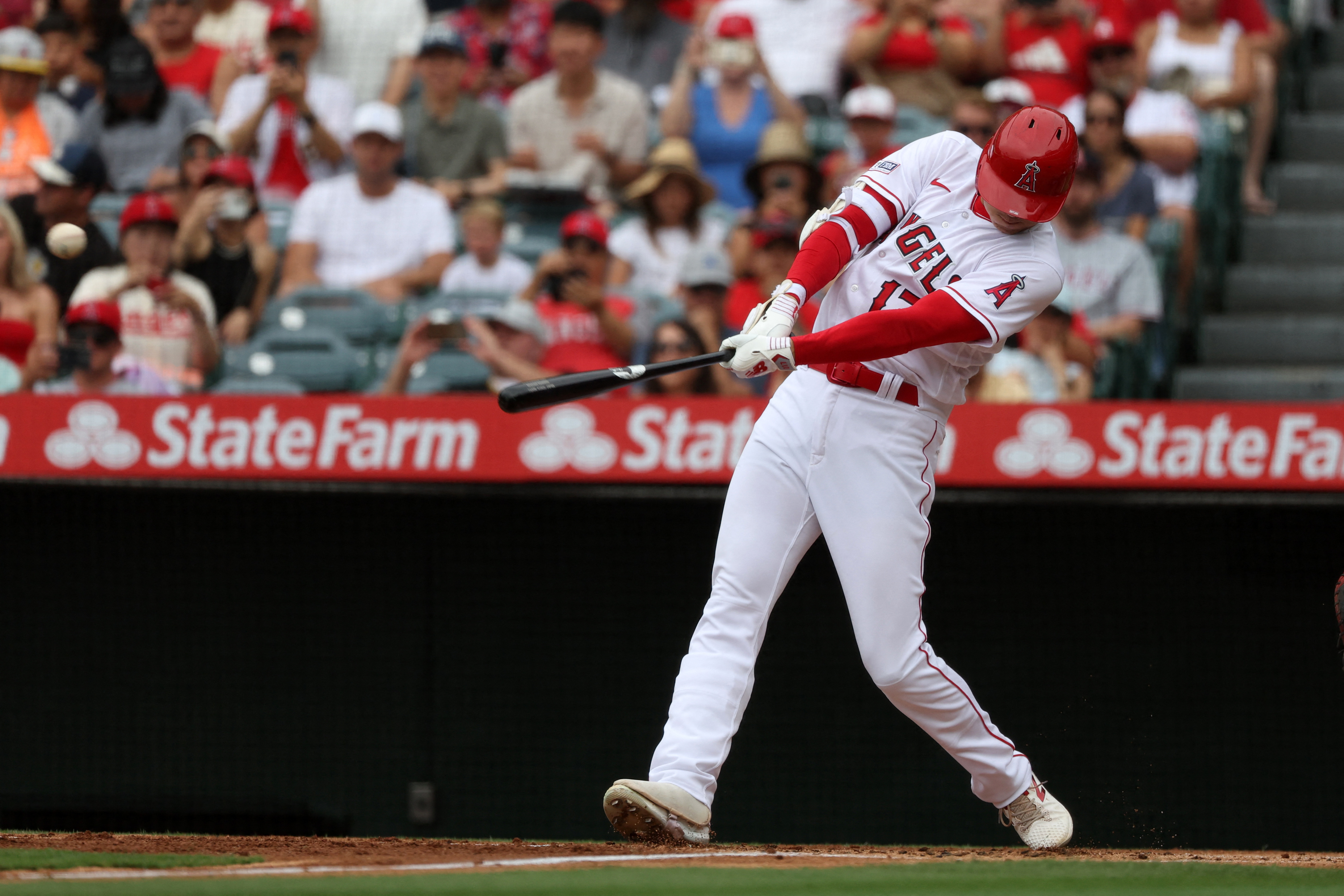 Angels hit four homers in win over Pirates