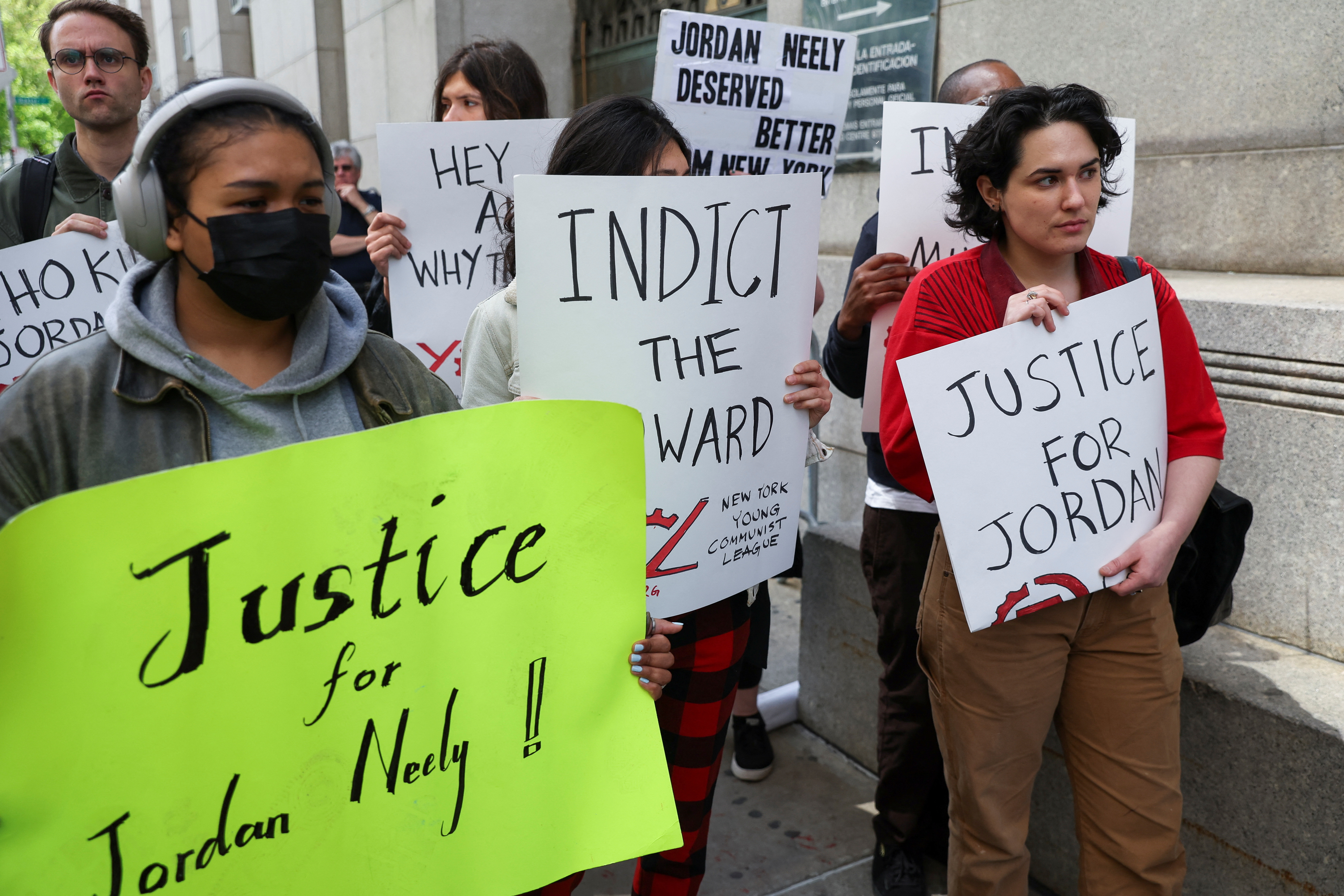 People protest the death of Jordan Neely outside the Manhattan DA's office in New York City