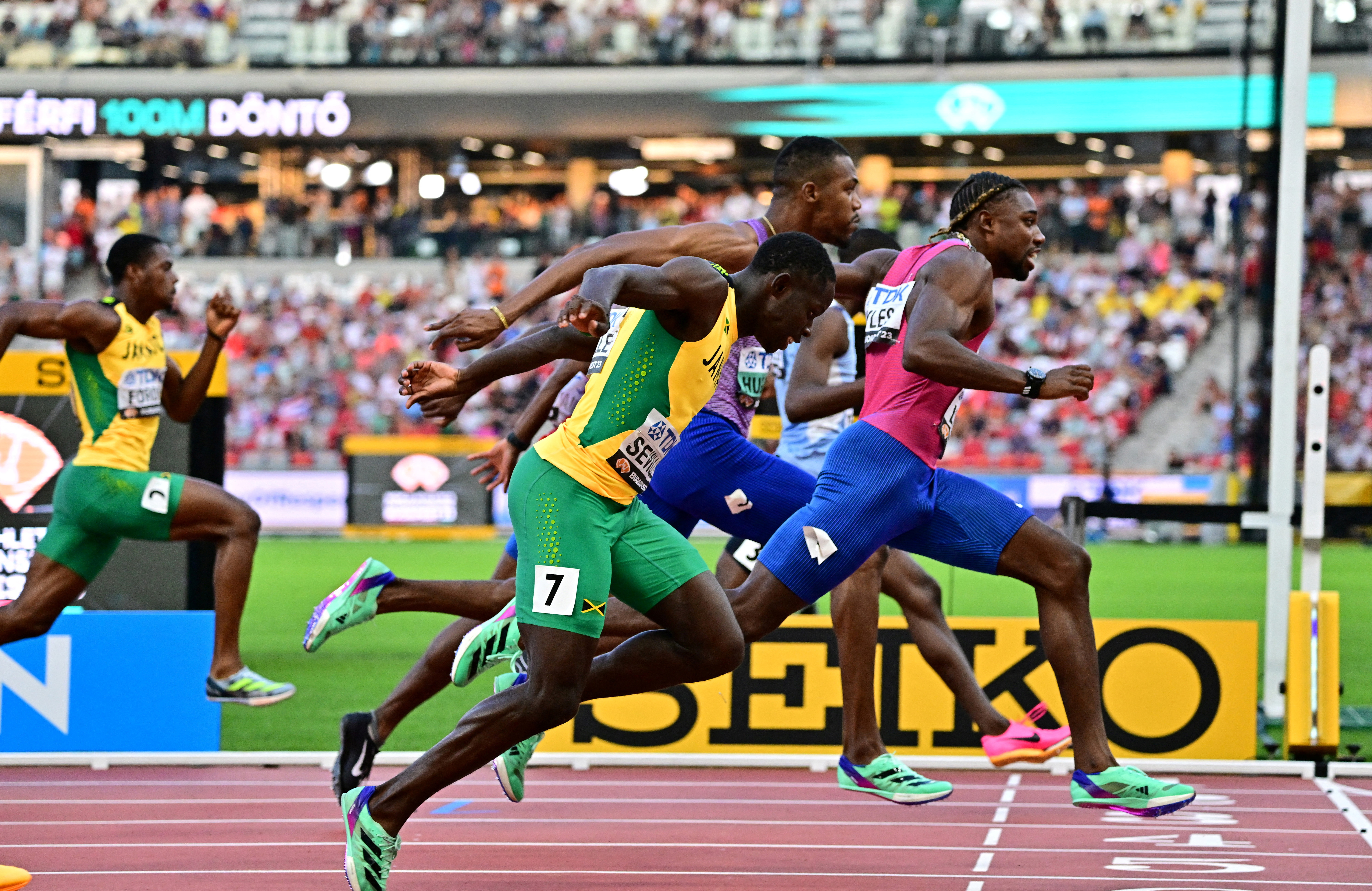 American Lyles delivers with 100m world gold | Reuters