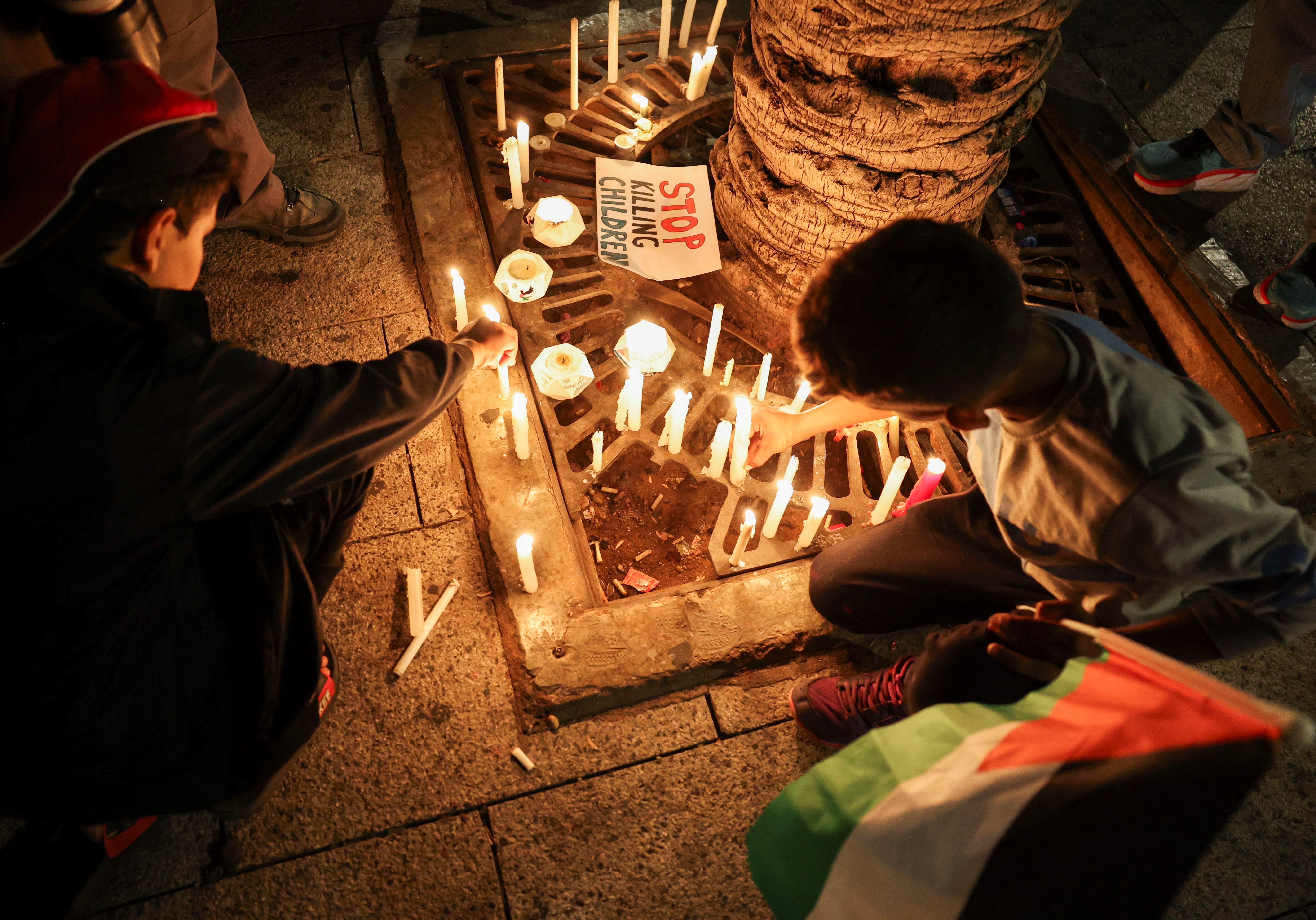 People take part in a candlelight vigil in support of Palestinians in Gaza, in Beirut