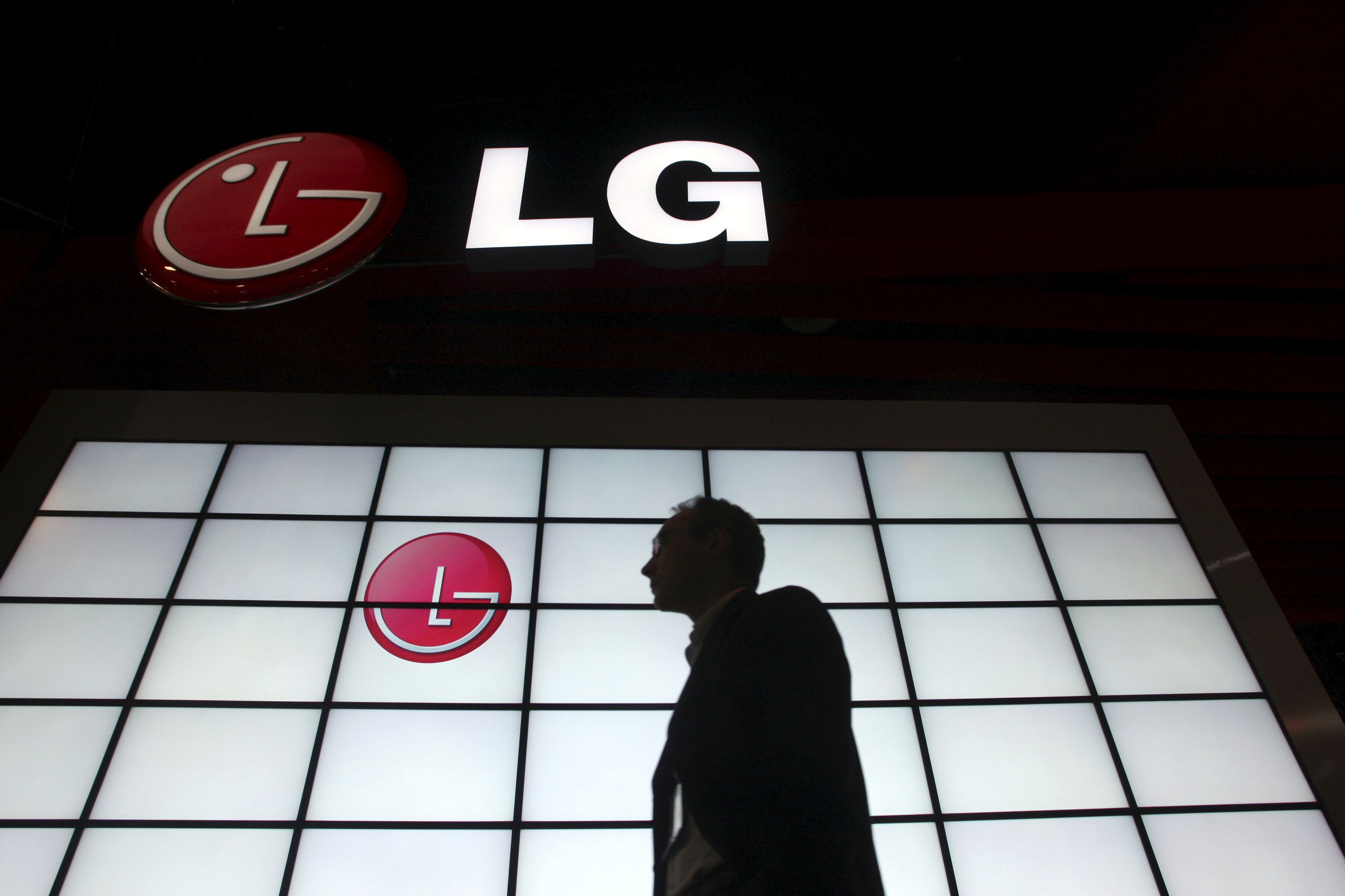 A show attendee passing by the LG Electronics booth during the 2009 International Consumer Electronics Show in Las Vegas