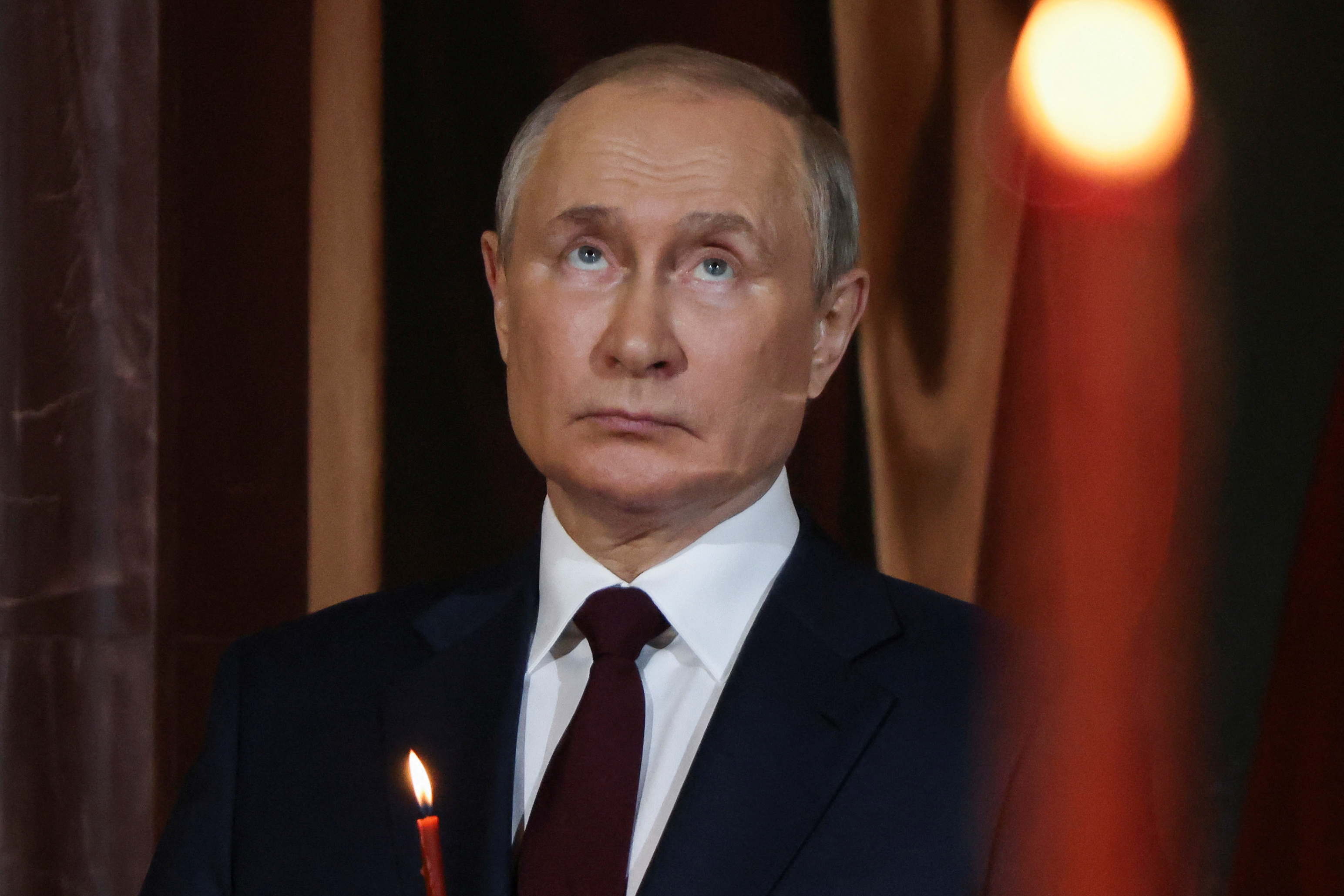 Russia's Putin attends midnight Orthodox Easter mass in Moscow | Reuters