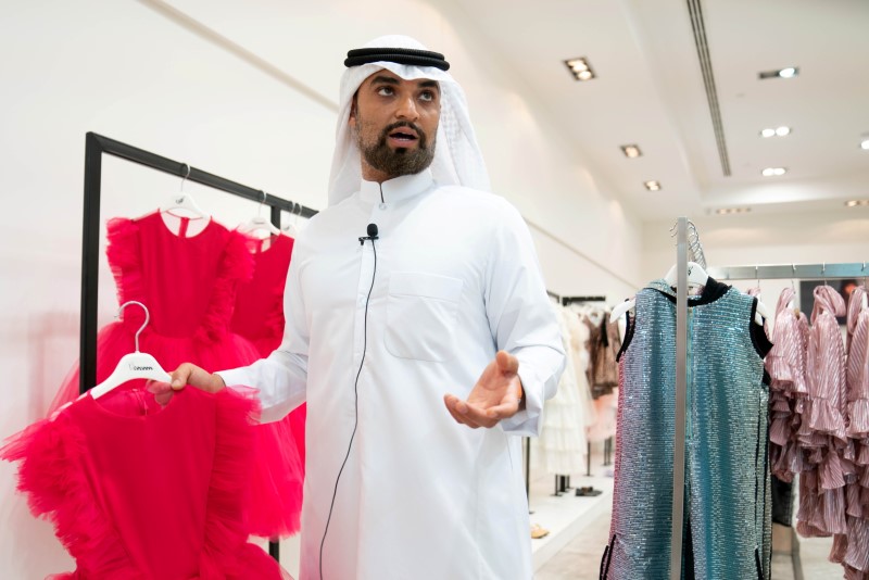 Kuwaiti entrepreneur Abdulaziz al-Mubarak, head of the Kuwaiti Union of Small and Medium Enterprises, speaks at his children's clothing store in Avenues mall in Al-Rai