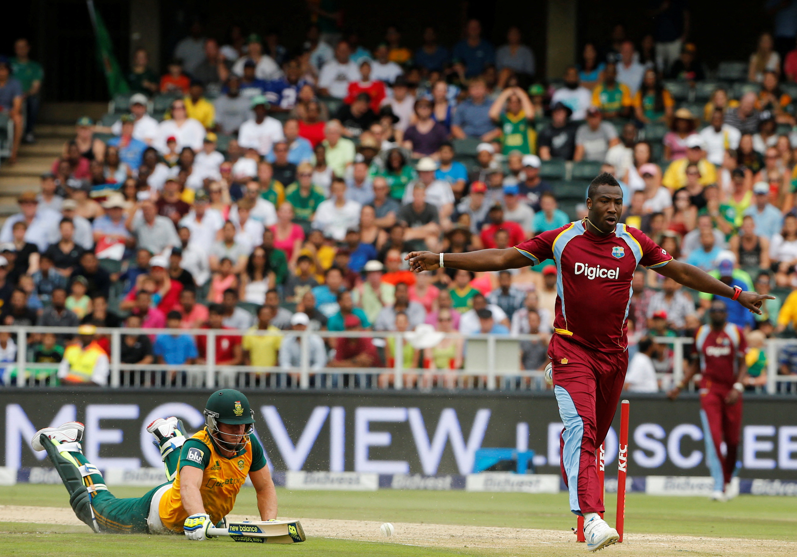 Andre Russell of the West Indies celebrates after the dismissal of South Africa's David Miller during their second T20 series at Wanderers Stadium in Johannesburg