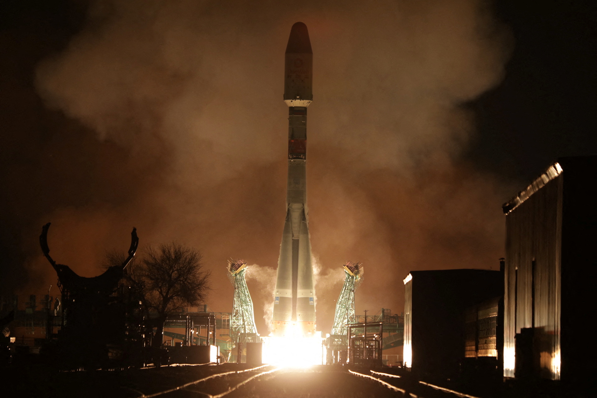 A rocket booster with satellites of OneWeb firm blasts off from a launchpad at the Baikonur Cosmodrome
