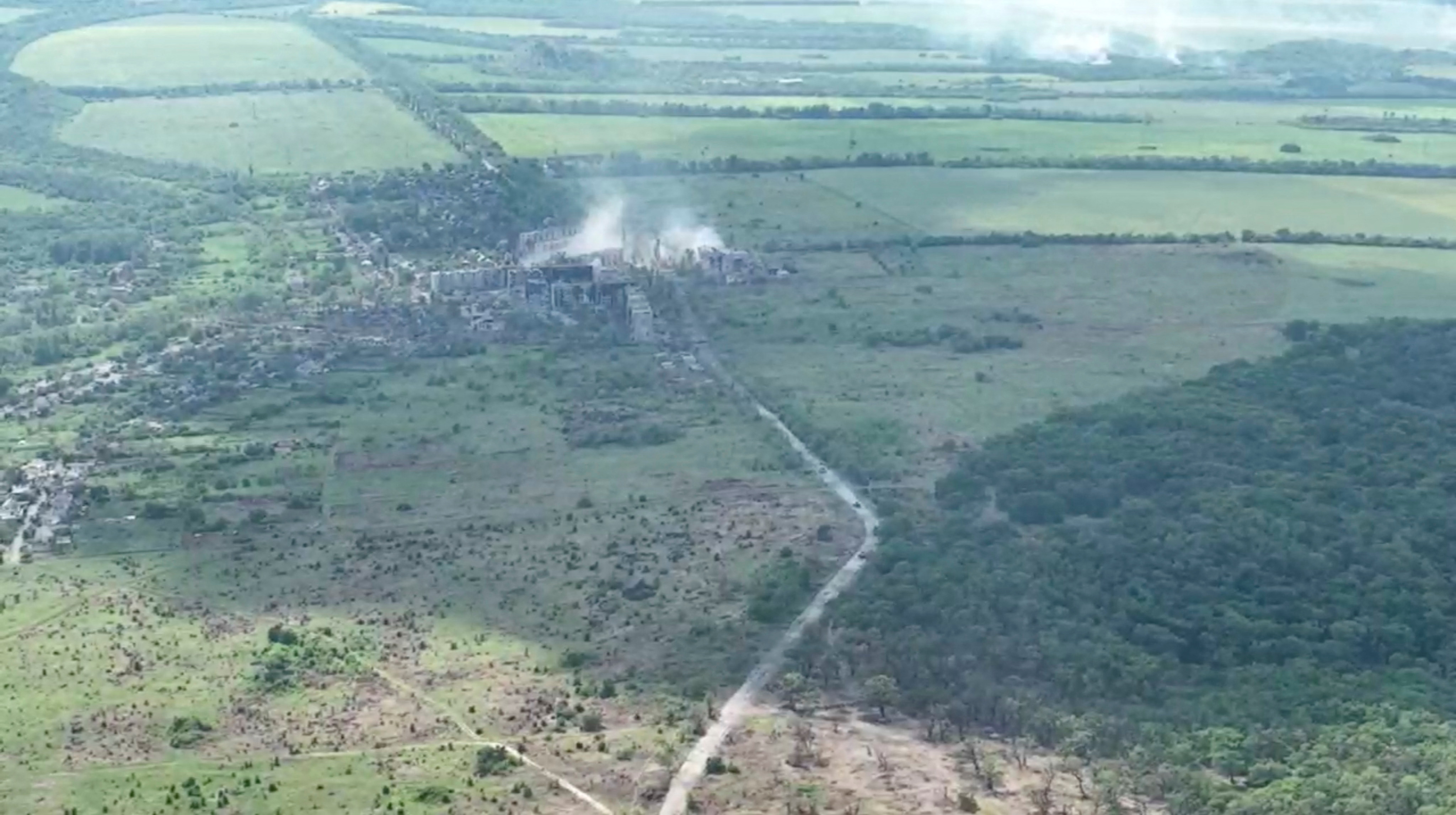 FILE PHOTO - Drone footage shows artillery strikes on the Ukrainian village of Toshkivka in the Luhansk region