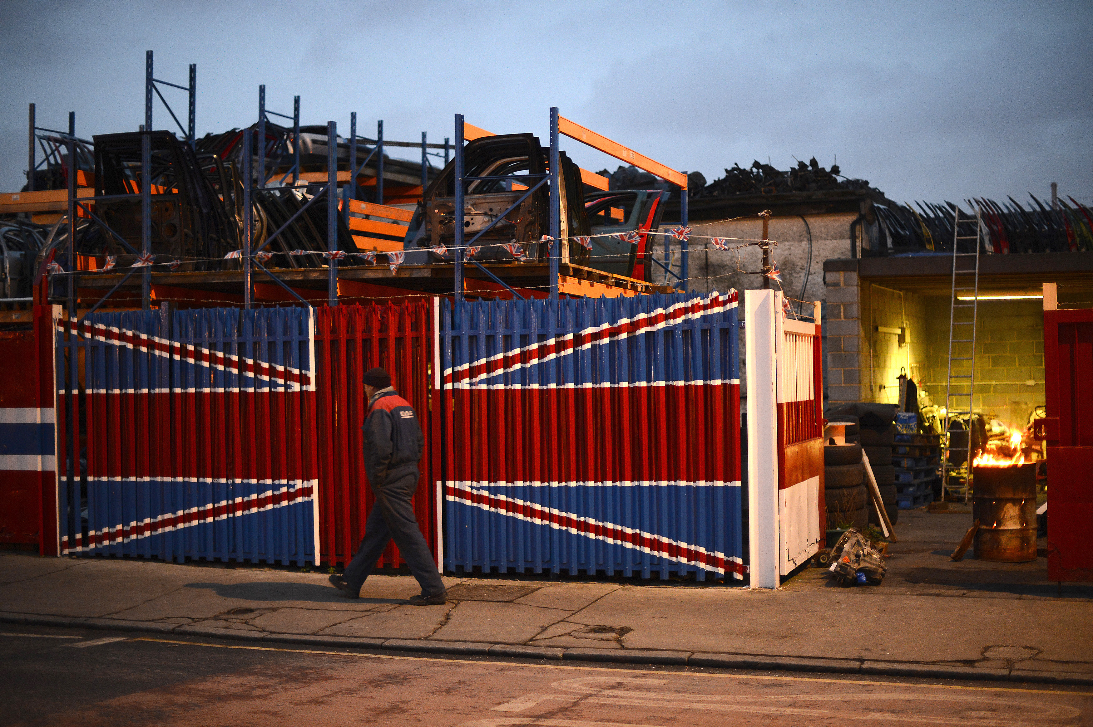 UK manufacturing growth hits 13-month low in March - PMI | Reuters