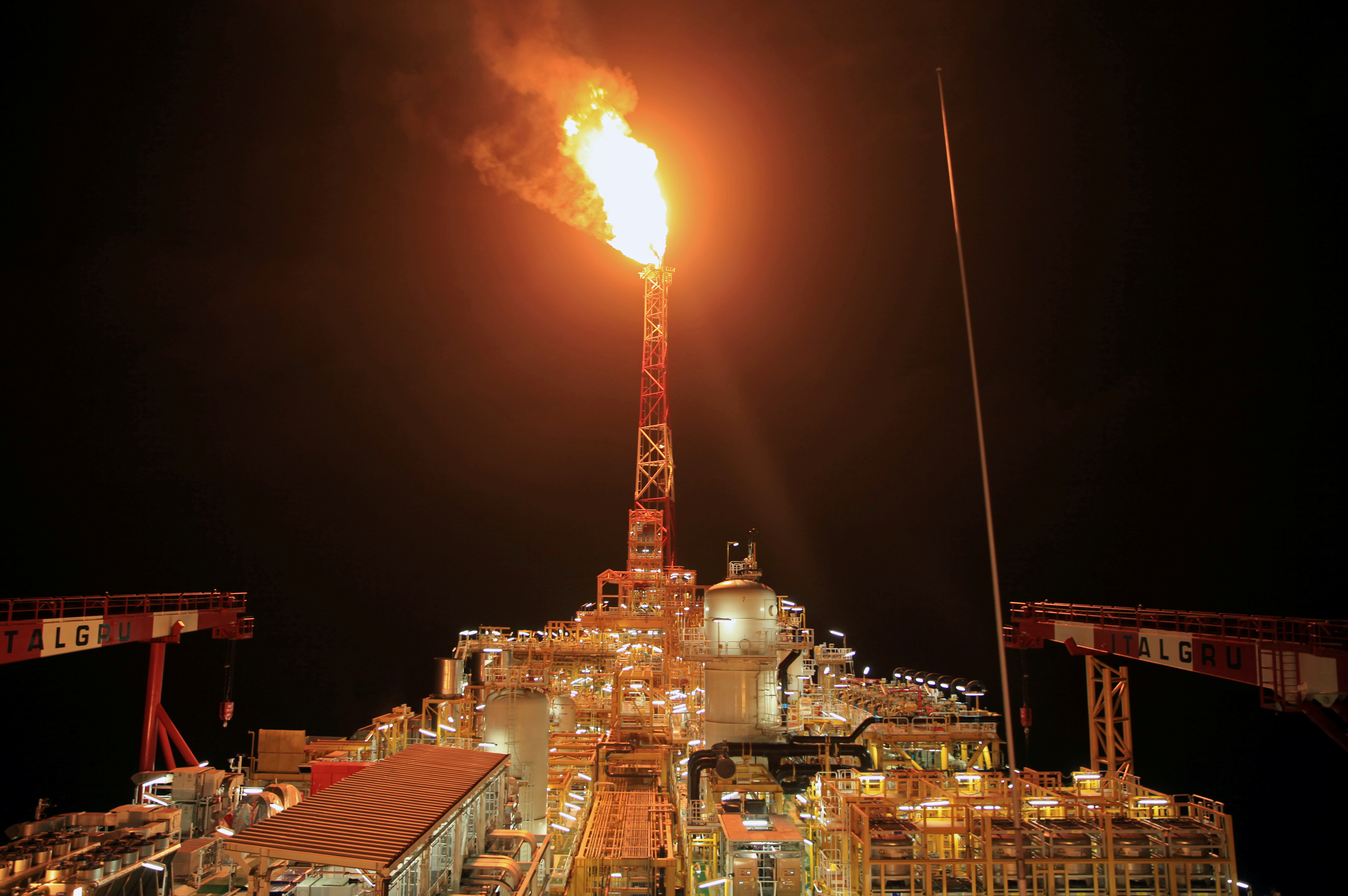 Kaombo Norte floating oil platform is seen at night off the coast of Angola