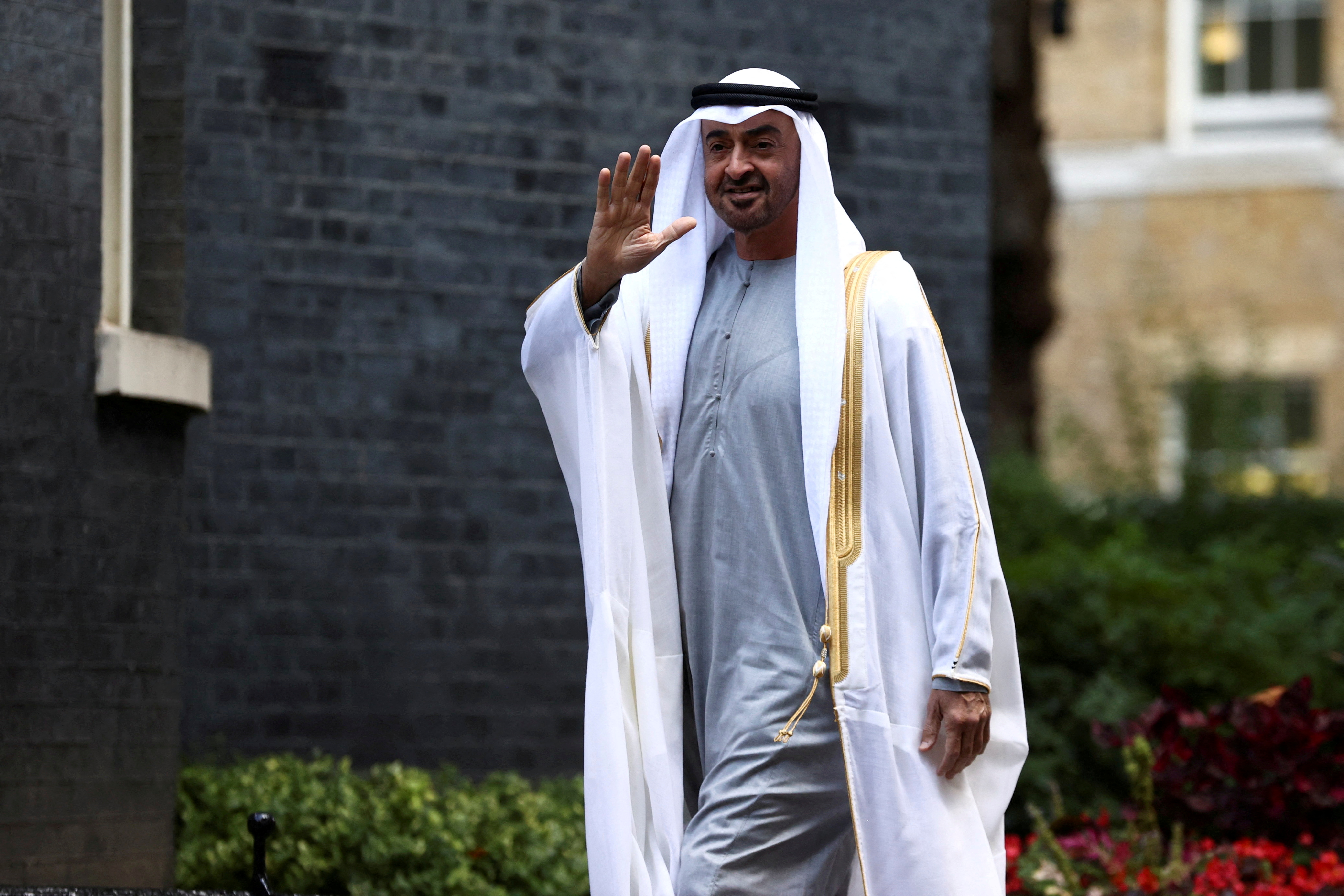 Abu Dhabi's Crown Prince walks outside Downing Street