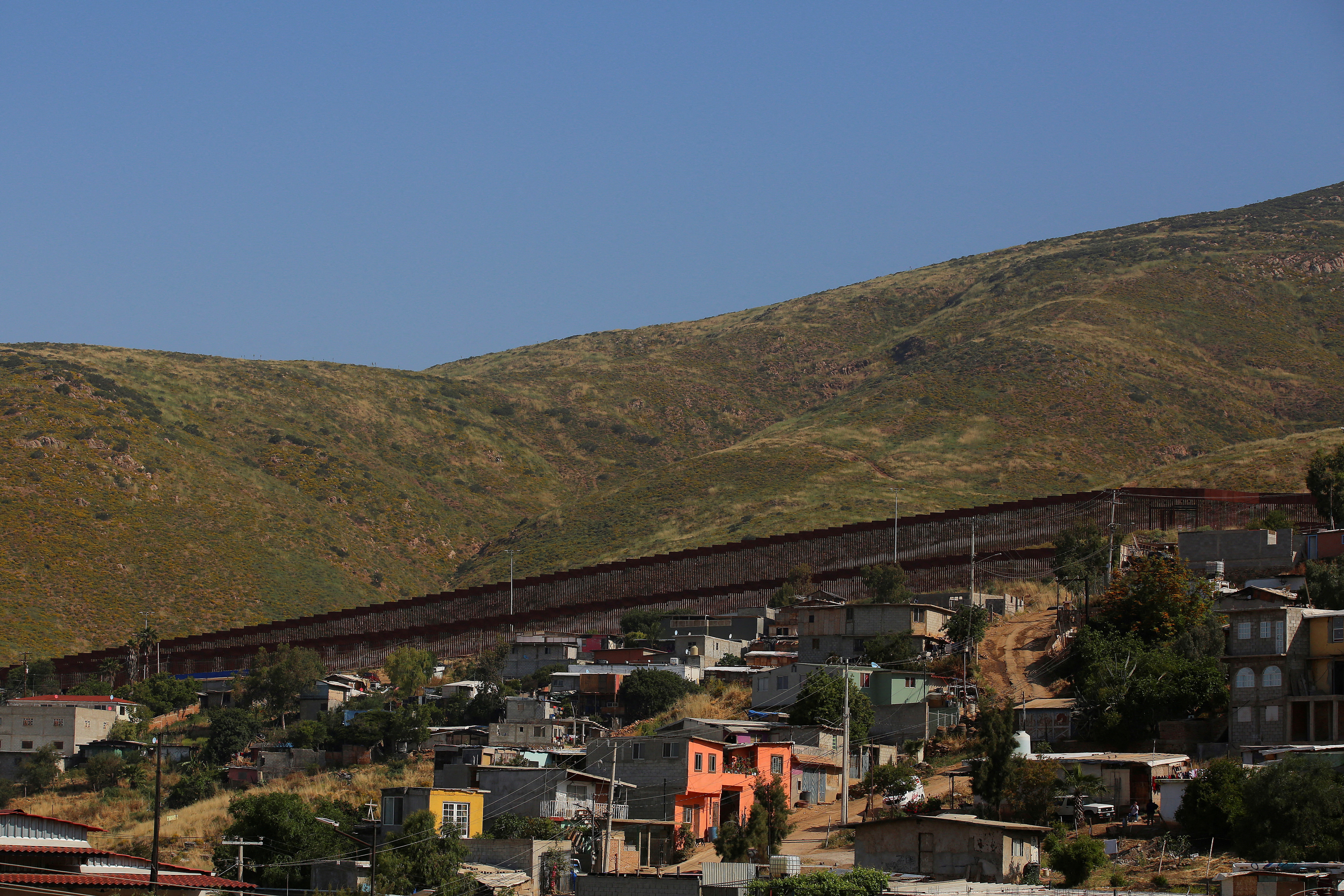 A general view shows the U.S.- Mexico border wall, as the United States prepares to lift COVID-19 era restrictions known as Title 42, in Tijuana