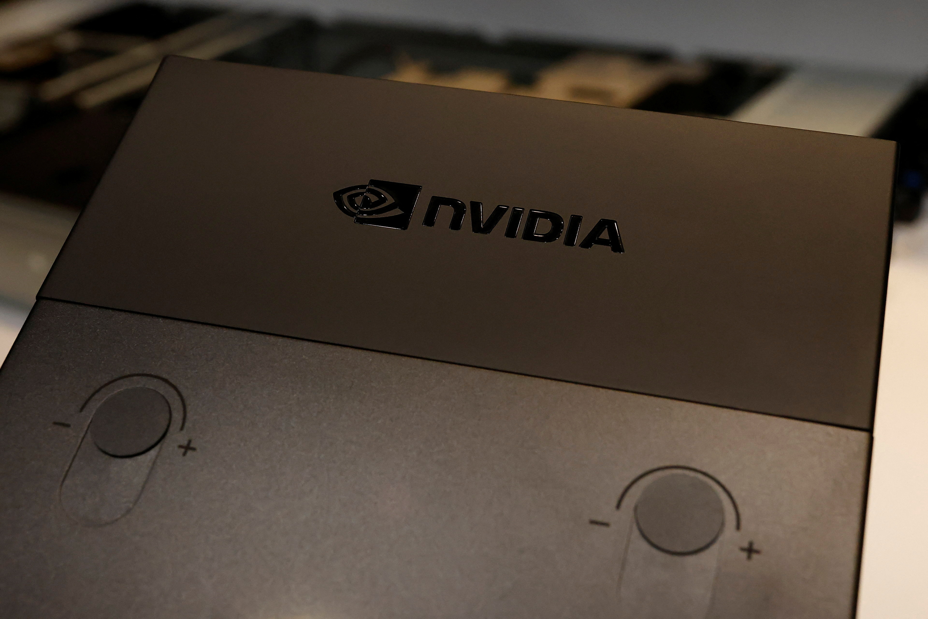 A Nvidia logo can be seen on one of their products on display at their headquarters in Taipei