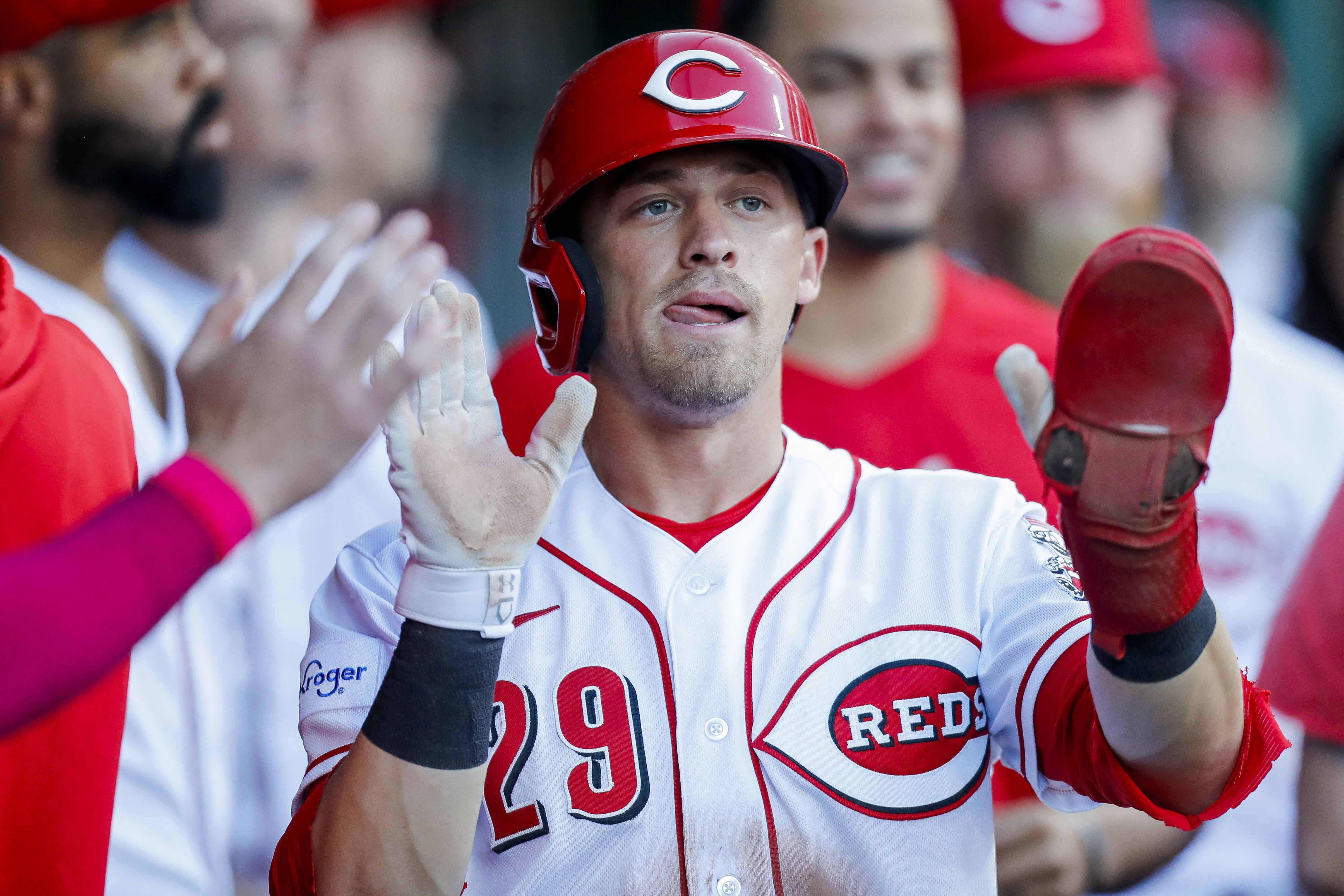 Reds build big lead, hold on for win over Mets