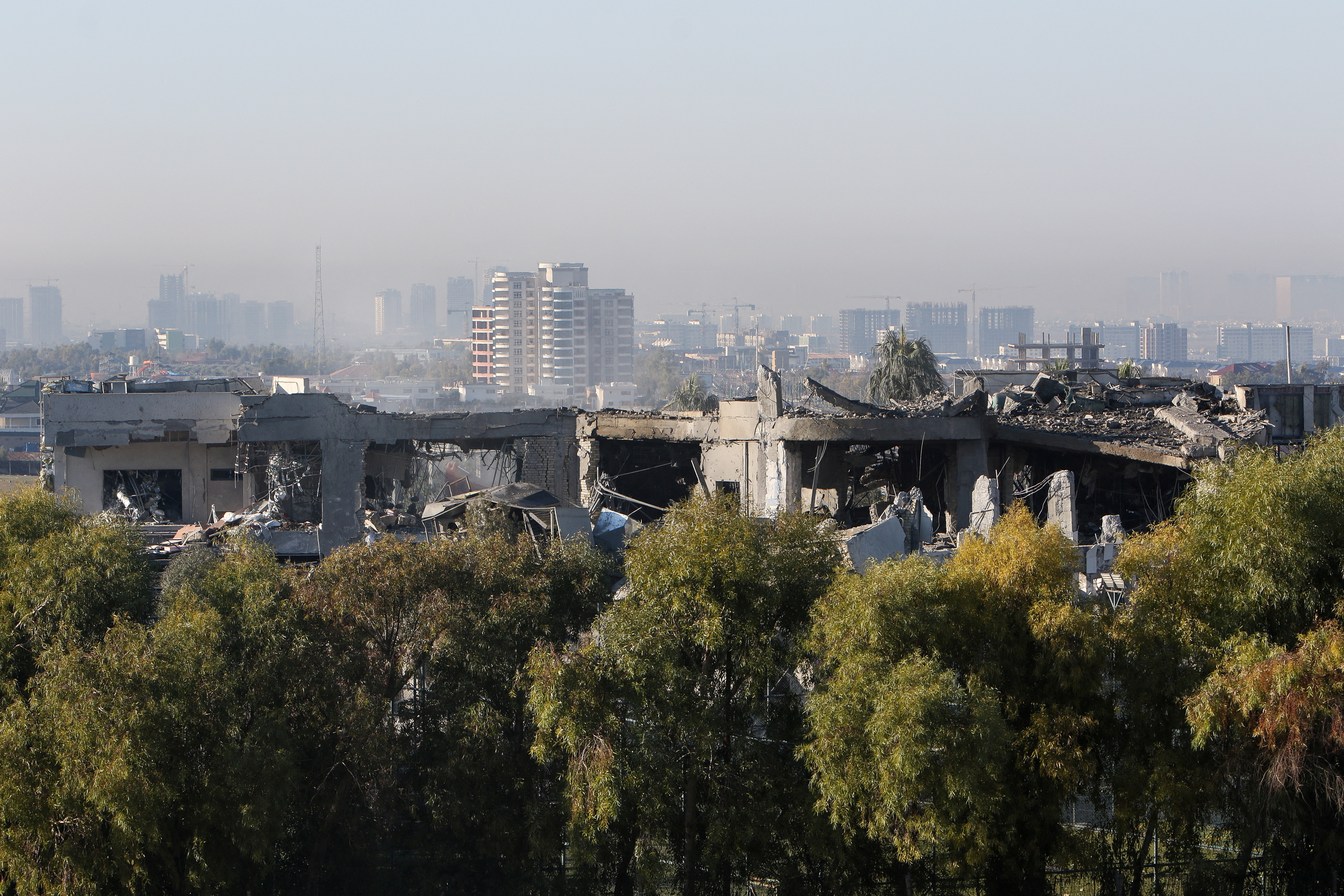 A view of a damaged building following missile attacks, in Erbil