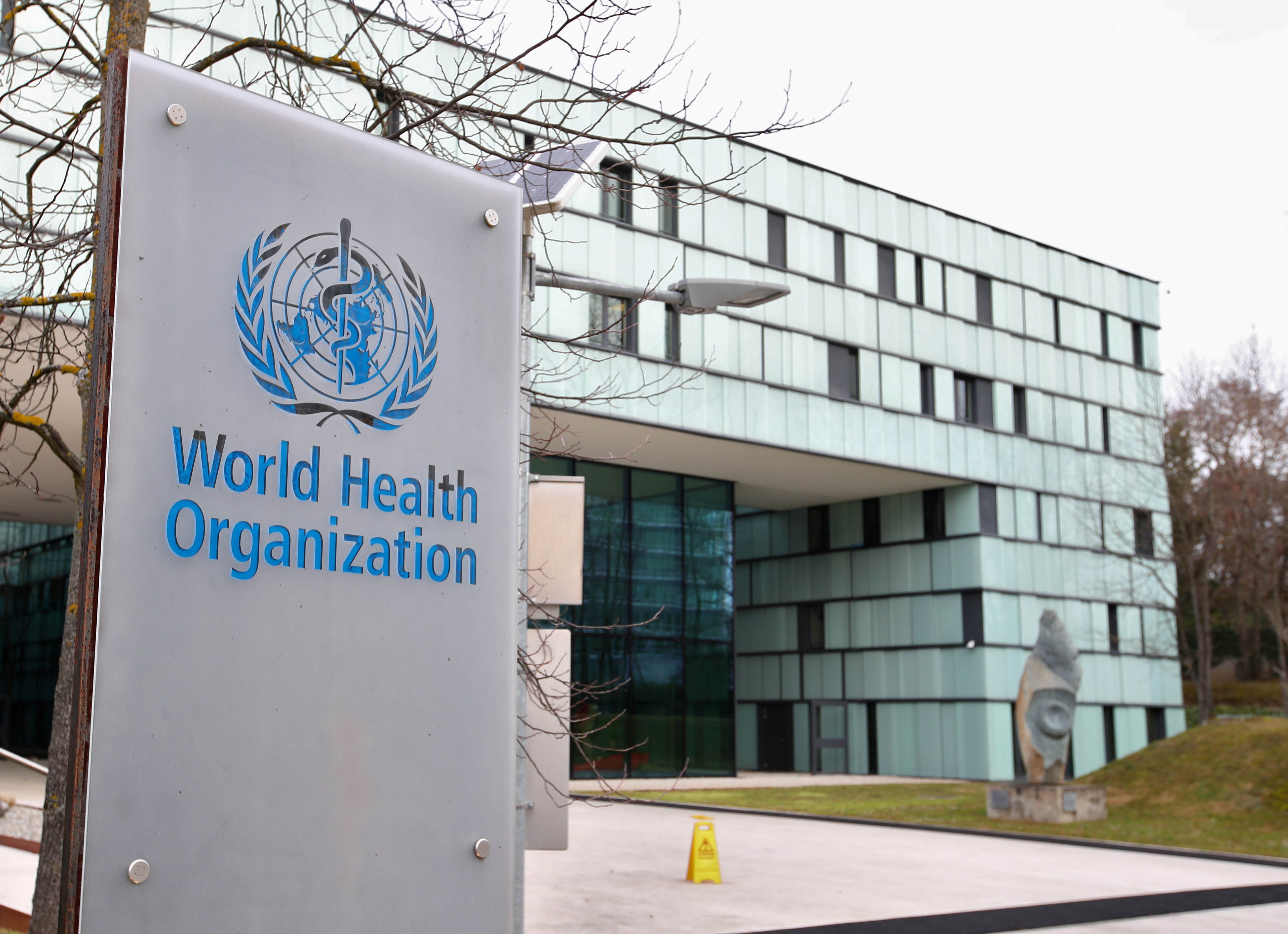 A logo is pictured outside a building of the  World Health Organization (WHO) during an executive board meeting on update on the coronavirus outbreak, in Geneva, Switzerland, February 6, 2020. REUTERS/Denis Balibouse