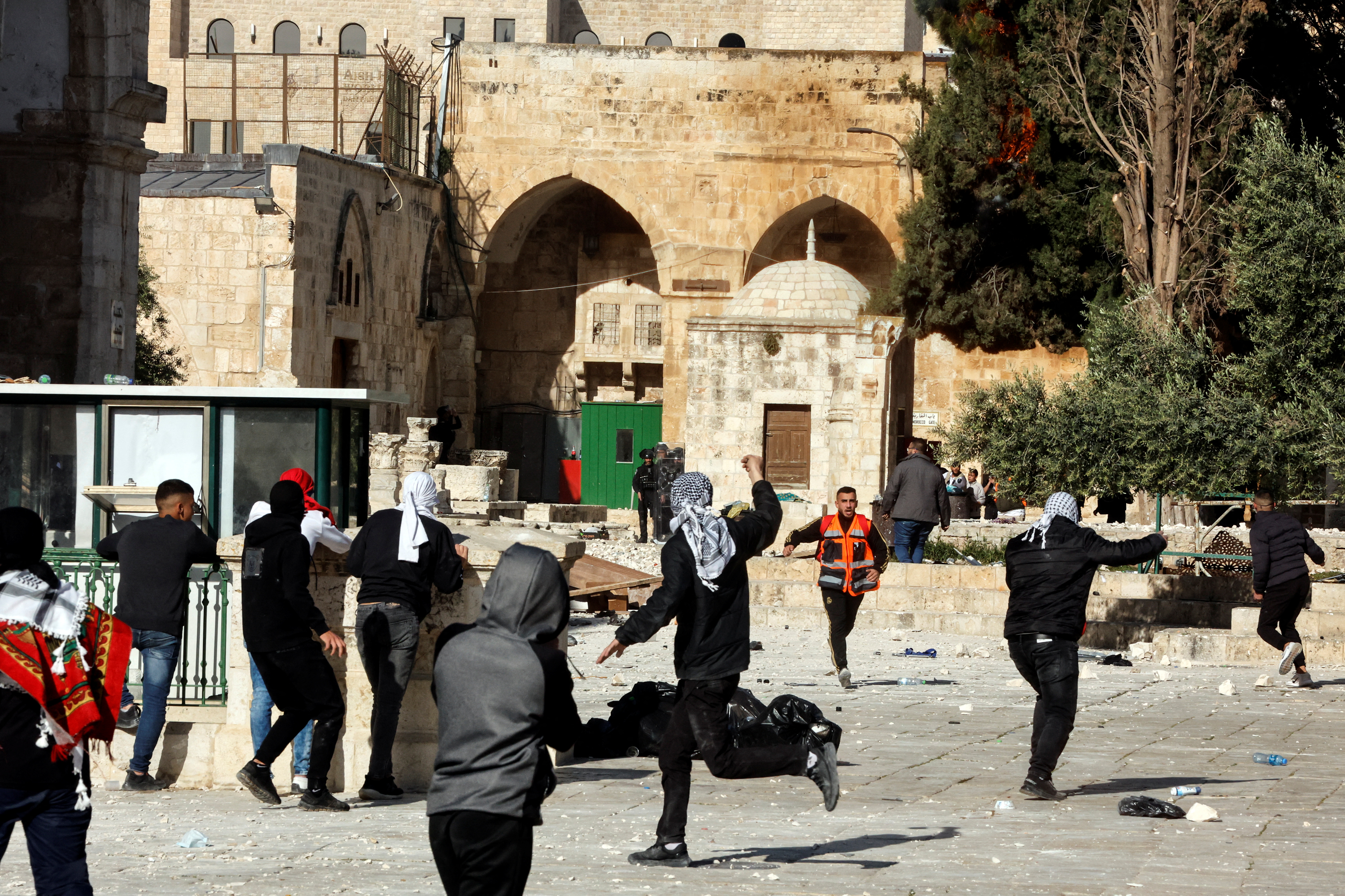 Palestinian protestors clash with Israeli security forces at the compound that houses Al-Aqsa Mosque, known to Muslims as Noble Sanctuary and to Jews as Temple Mount, in Jerusalem's Old City