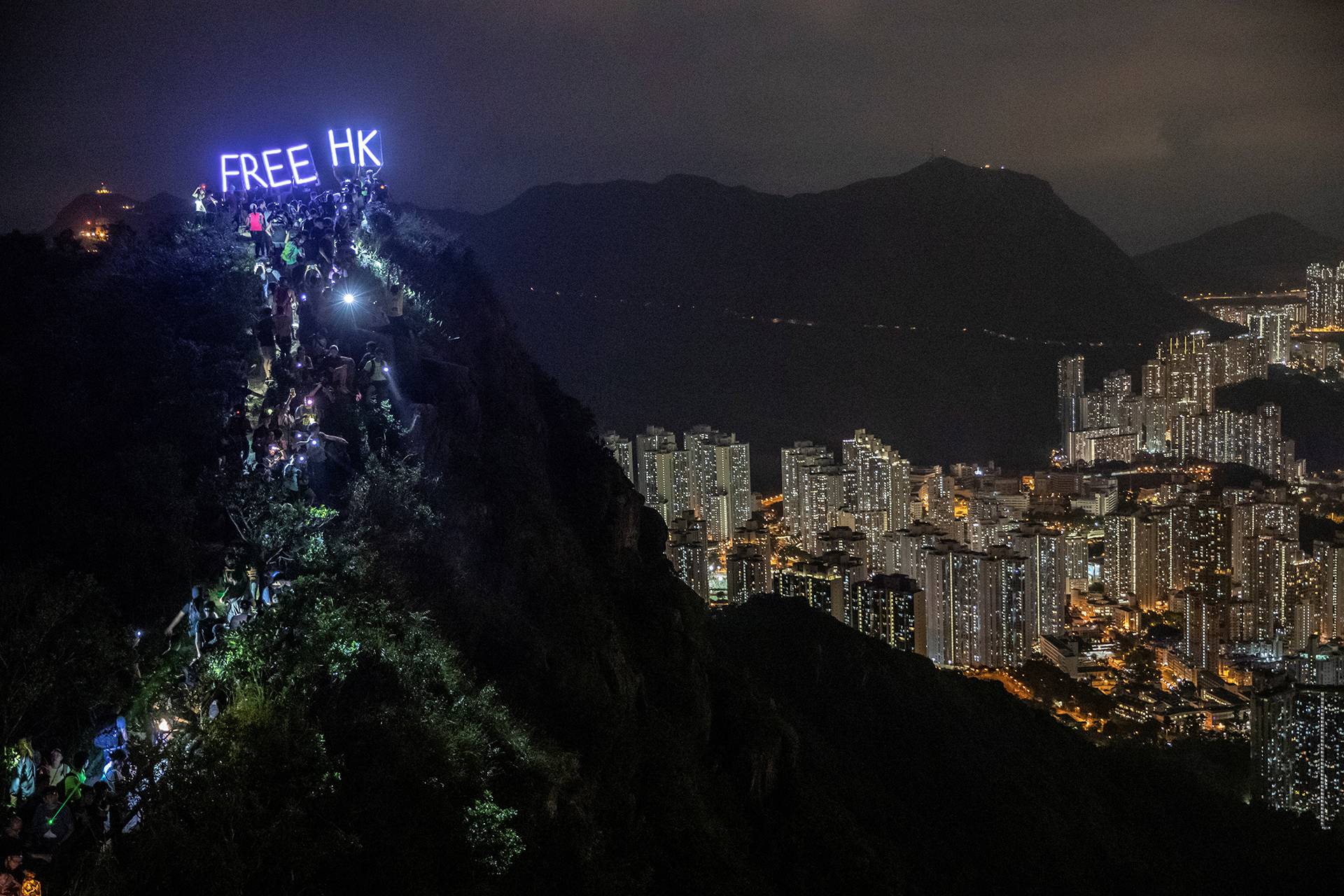 Anti-government protesters gather at Lion Rock, in Hong Kong