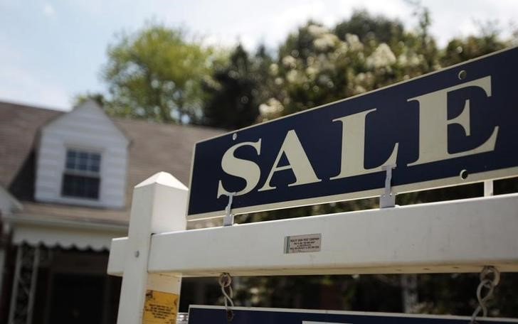 A sale sign advertises a home in Alexandria, Virginia