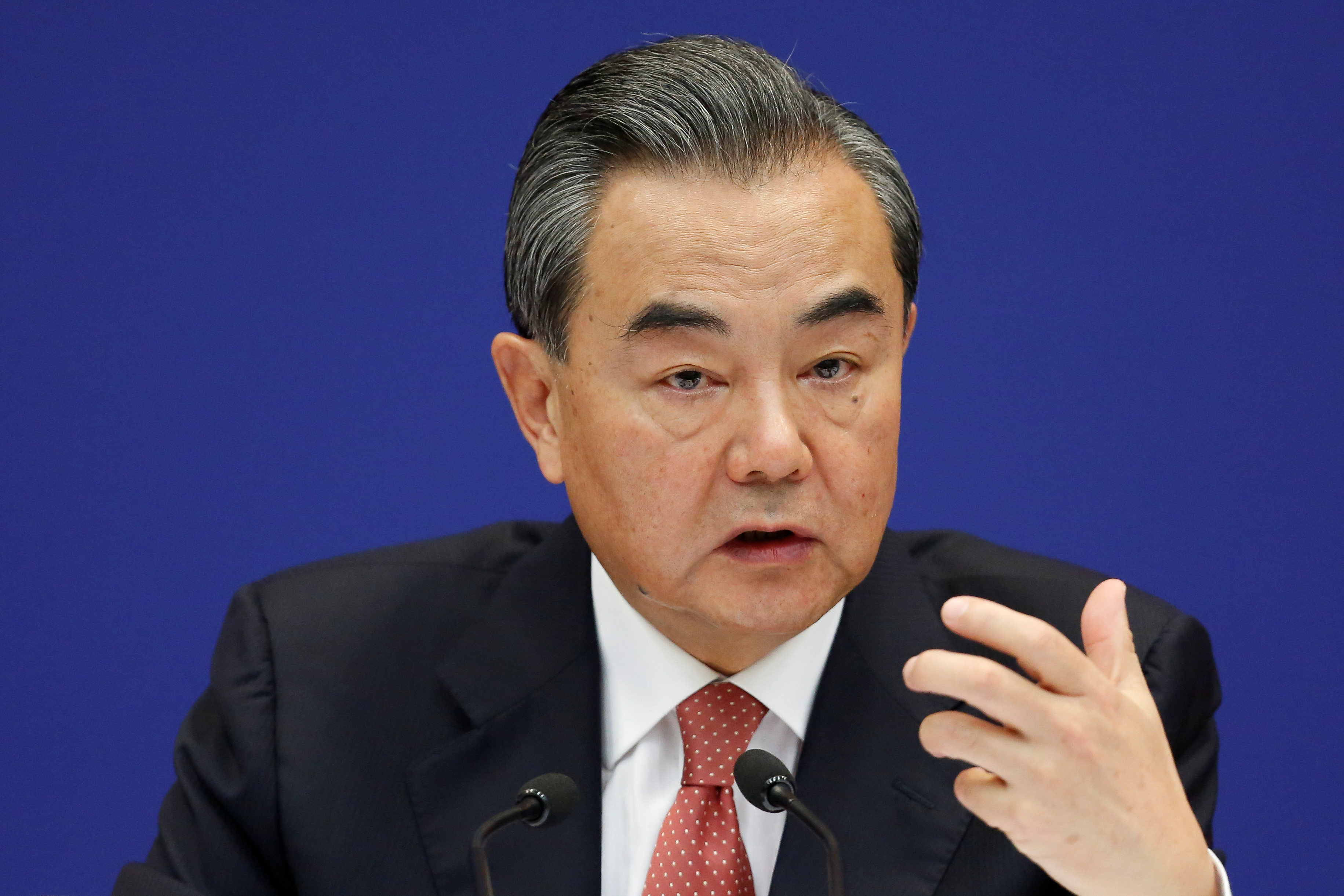 Chinese Foreign Minister Wang Yi holds a news briefing ahead of the 9th BRICS Summit, in Beijing
