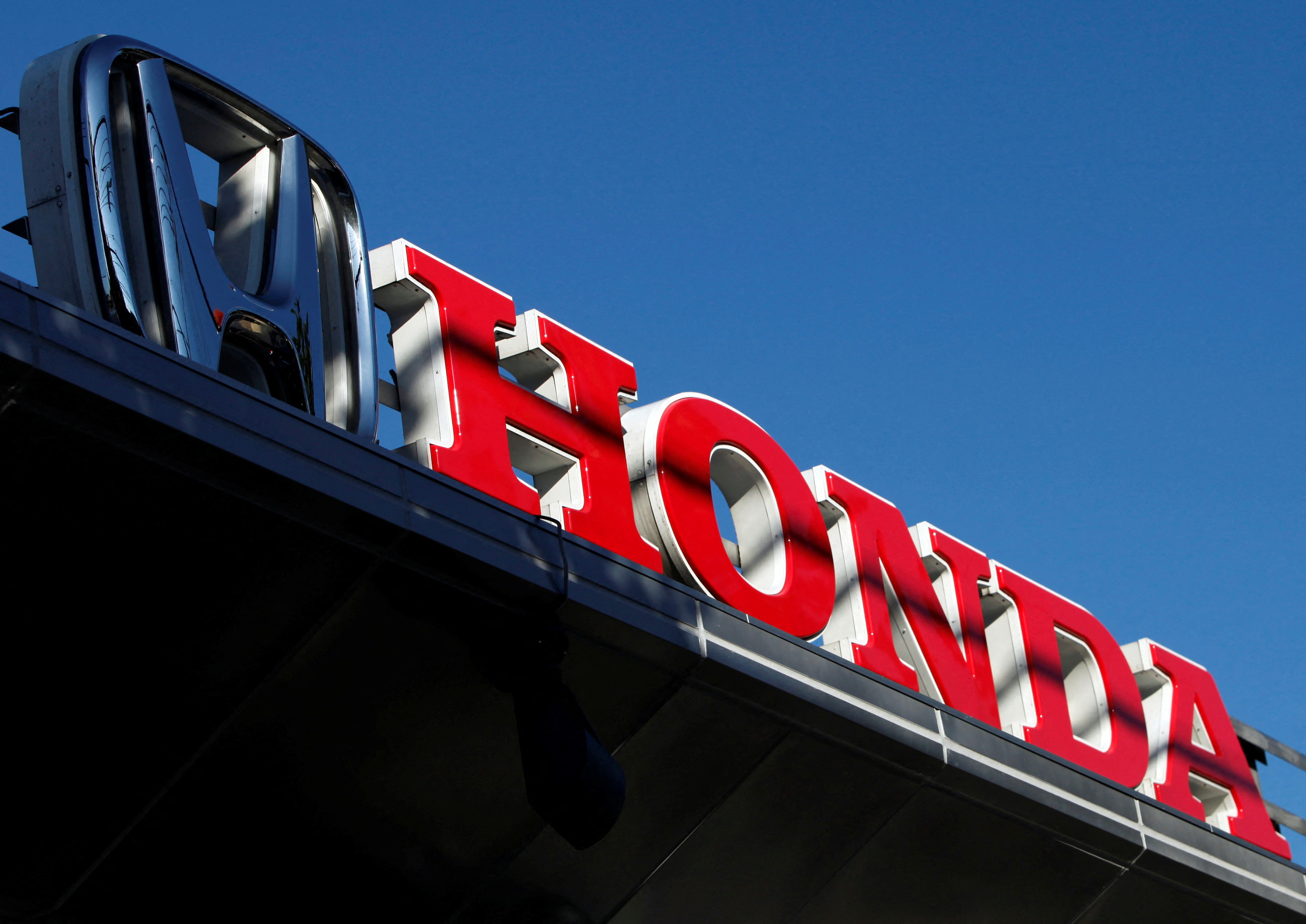 A Honda Motor logo is pictured at a dealer for the company in Kawasaki, south of Tokyo