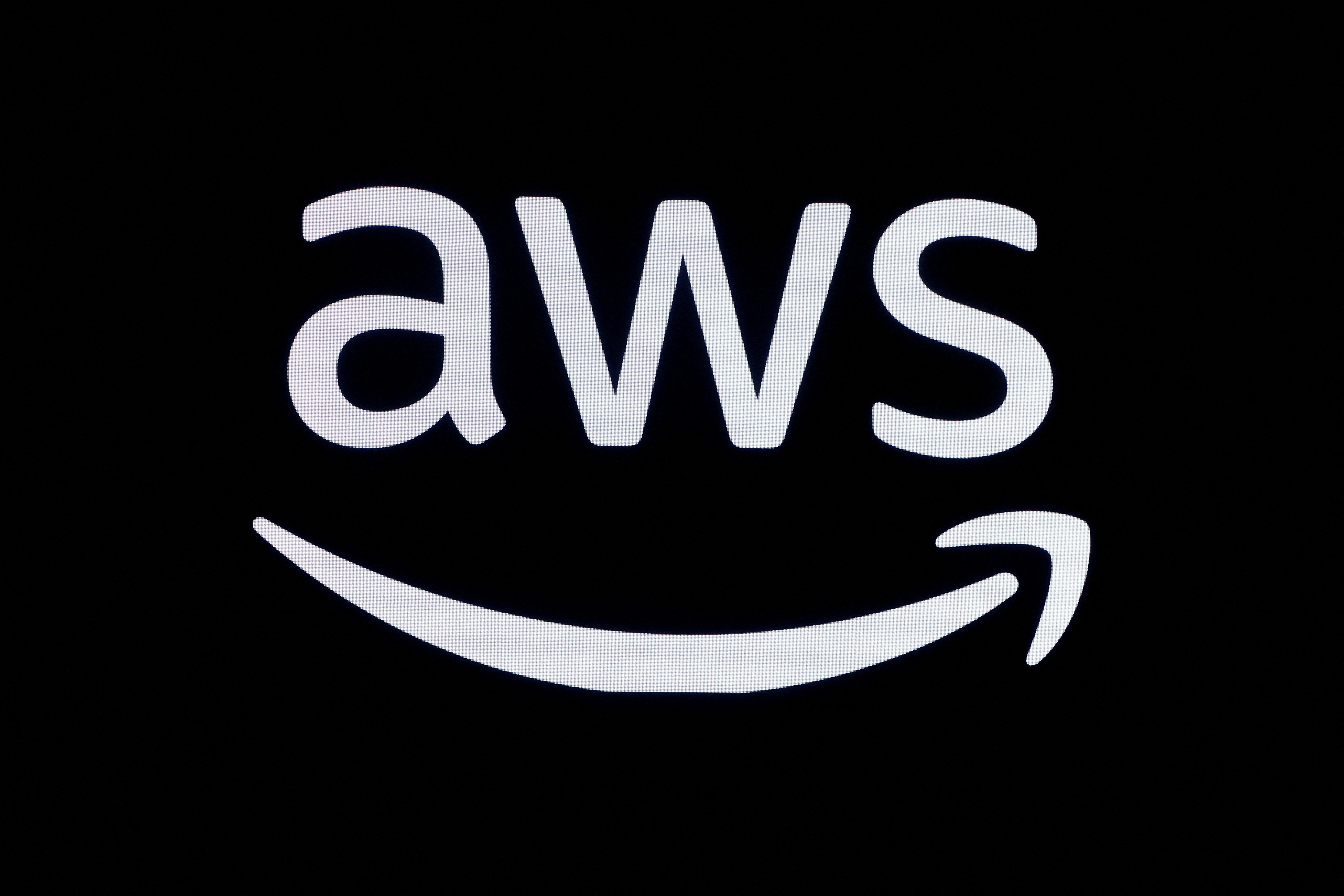 A logo for Amazon Web Services is seen in Paris