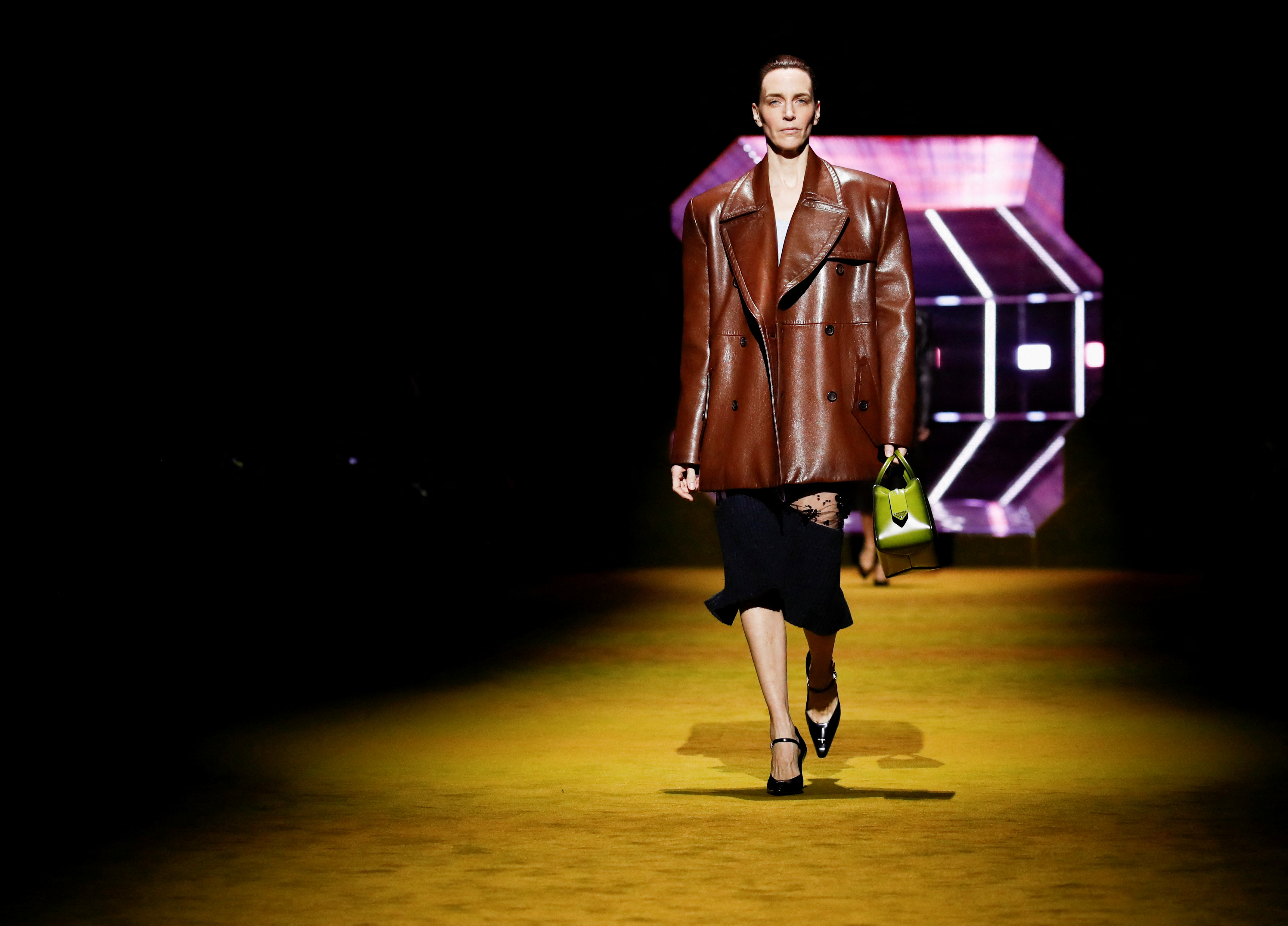 Prada celebrates 'history of women' at Milan Fashion Week show | Reuters