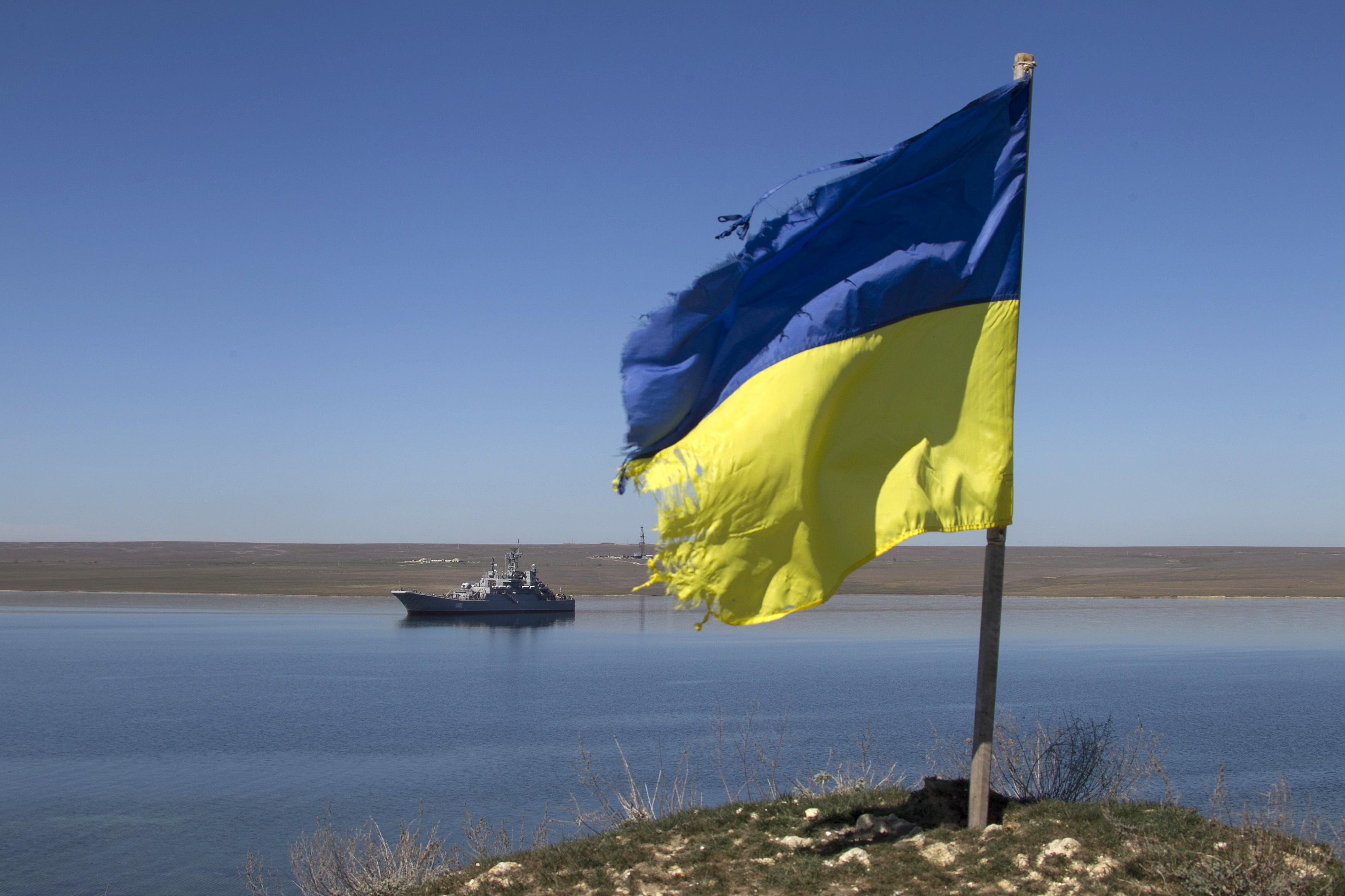 A Ukrainian flag placed by a family member of a sailor on board the Ukrainian naval landing vessel 
