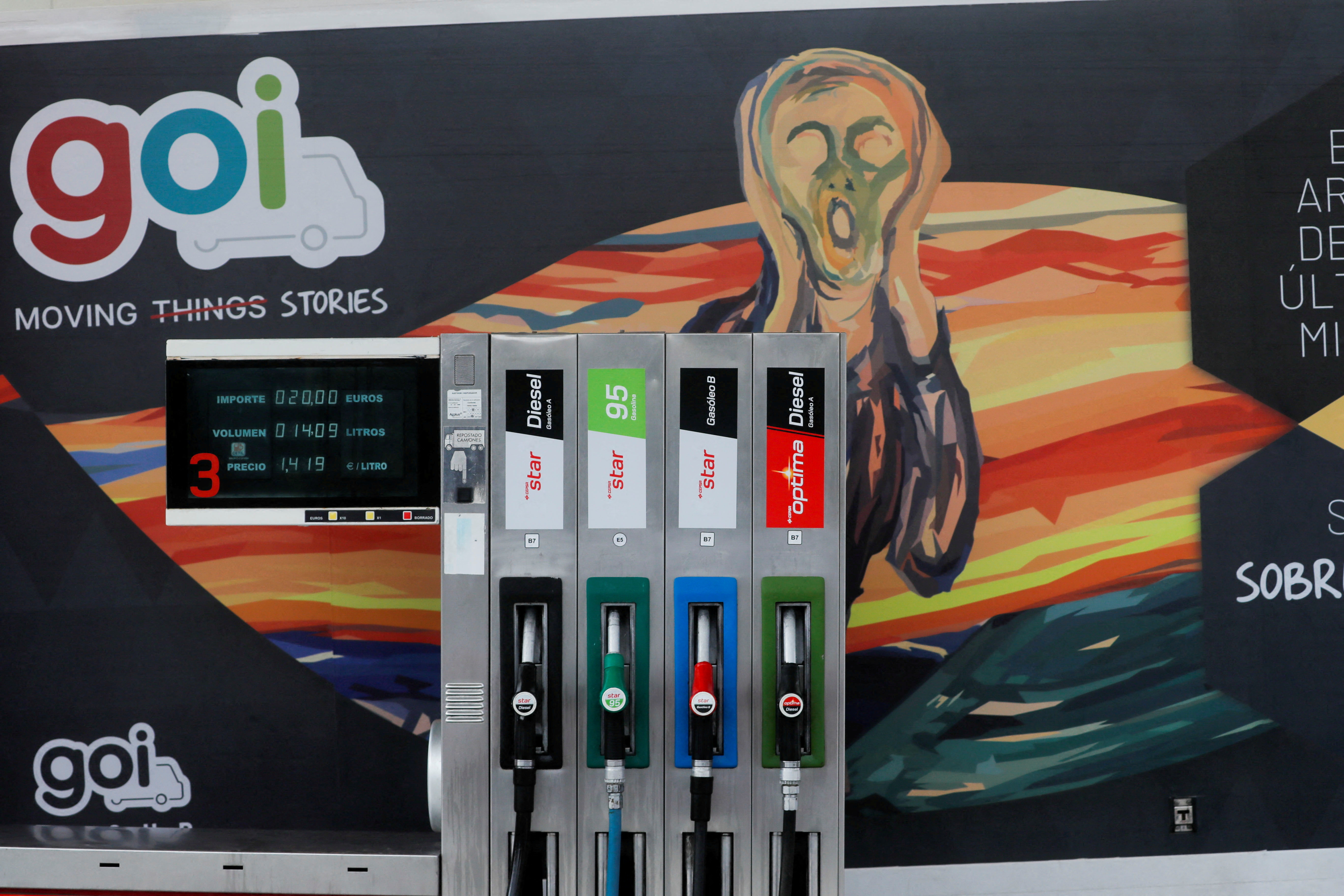 A GOI company truck is seen next to fuel pumps at a Cepsa petrol station in Cuevas del Becerro