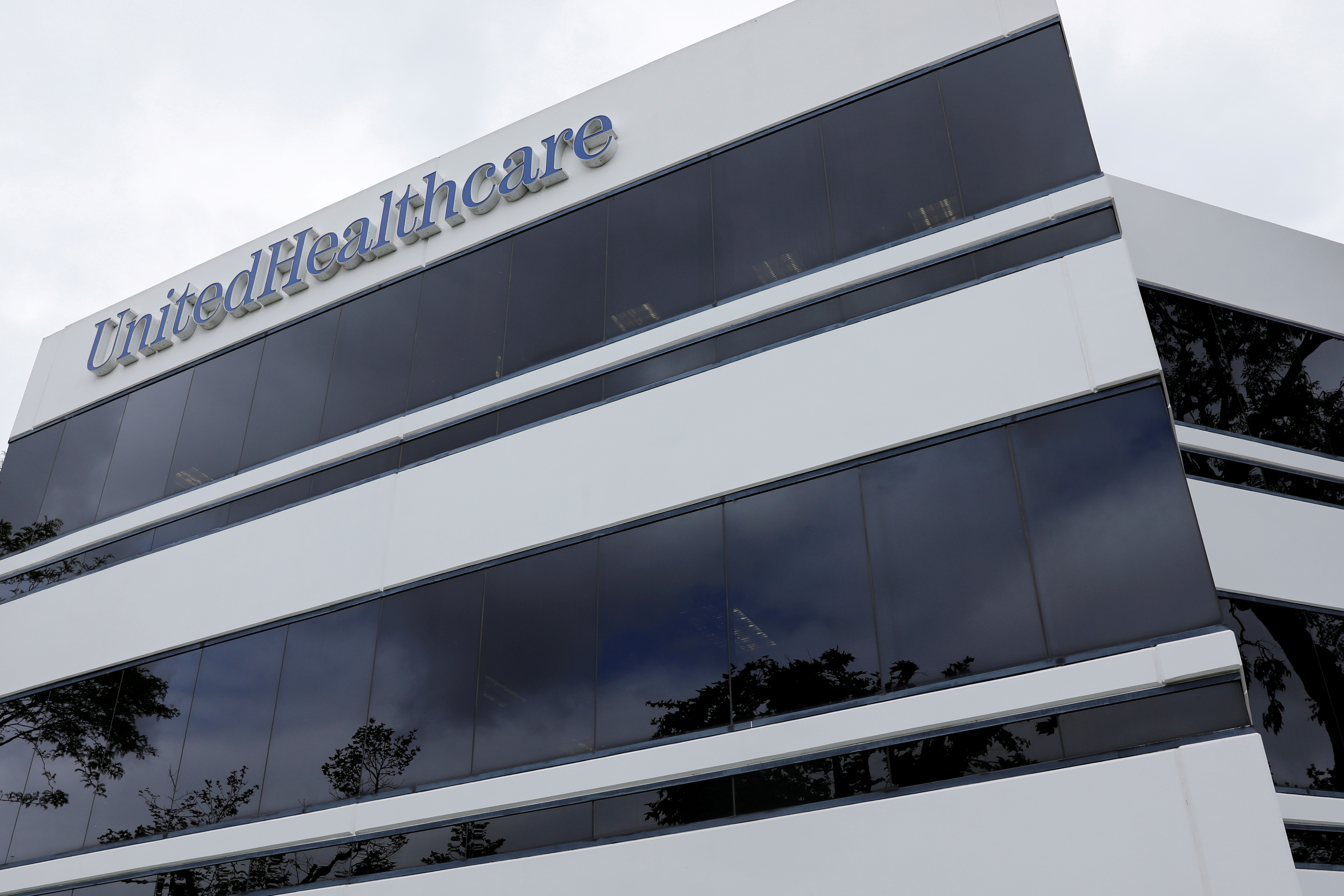 The corporate logo of the UnitedHealth Group appears on the side of one of their office buildings in Santa Ana, California, U.S., April 13, 2020. REUTERS/Mike Blake