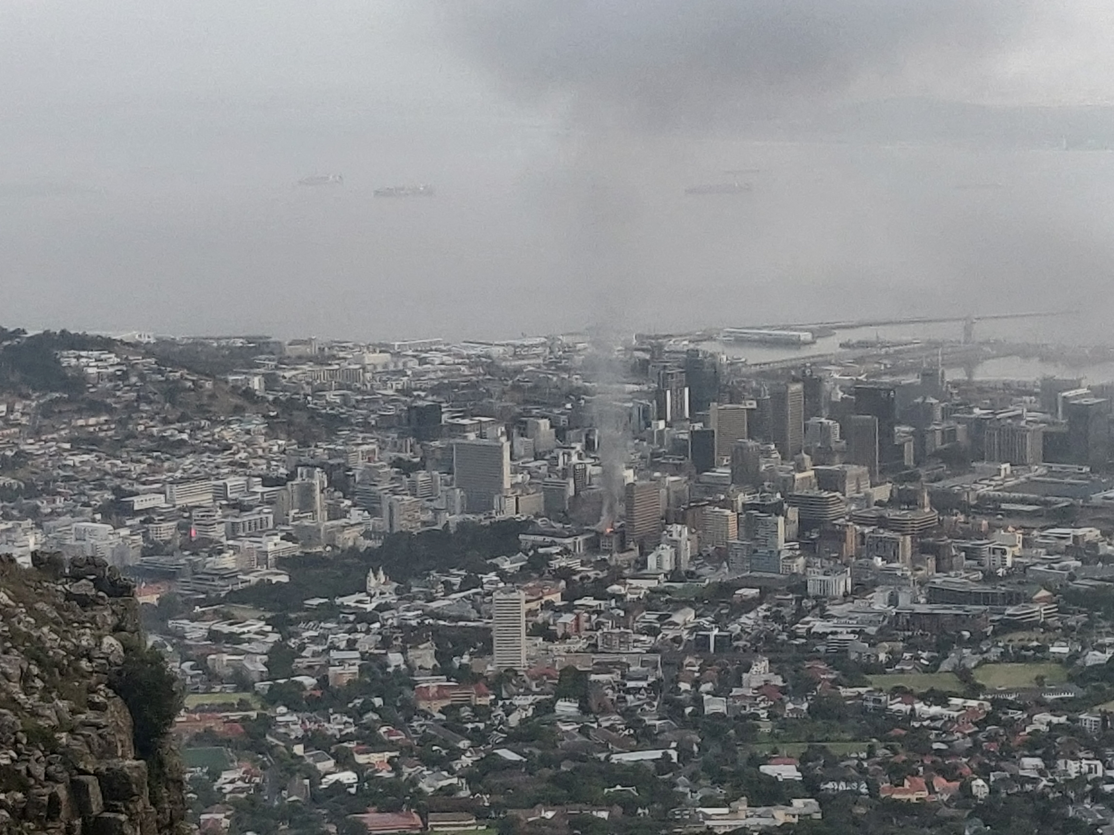 Smoke rises from a burning building in Cape Town