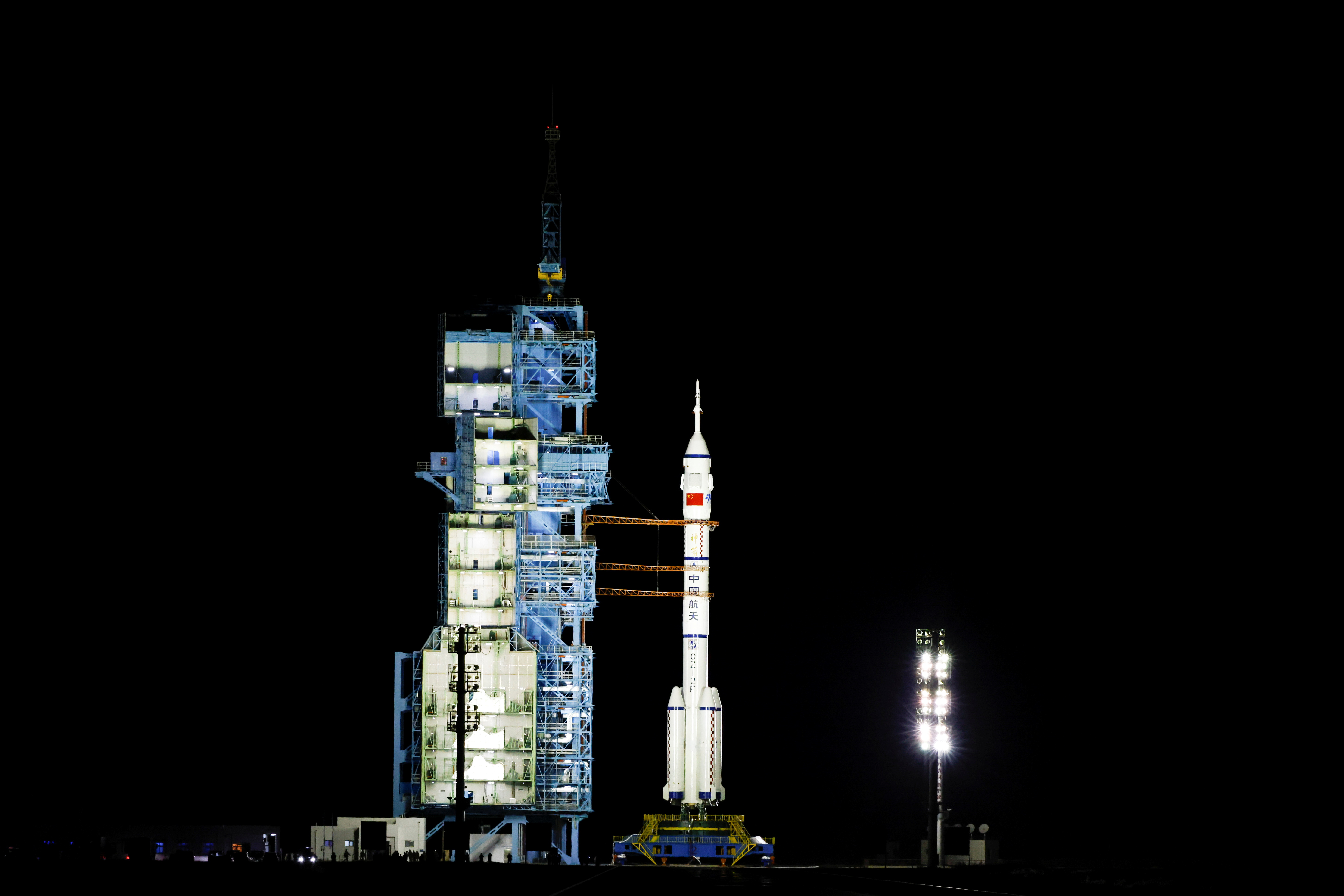 A general view of the Long March-2F Y13 rocket, carrying the Shenzhou-13 spacecraft and three astronauts in China's second crewed mission to build its own space station, before its launch at Jiuquan Satellite Launch Center near Jiuquan, Gansu province, China October 15, 2021. REUTERS/Carlos Garcia Rawlins