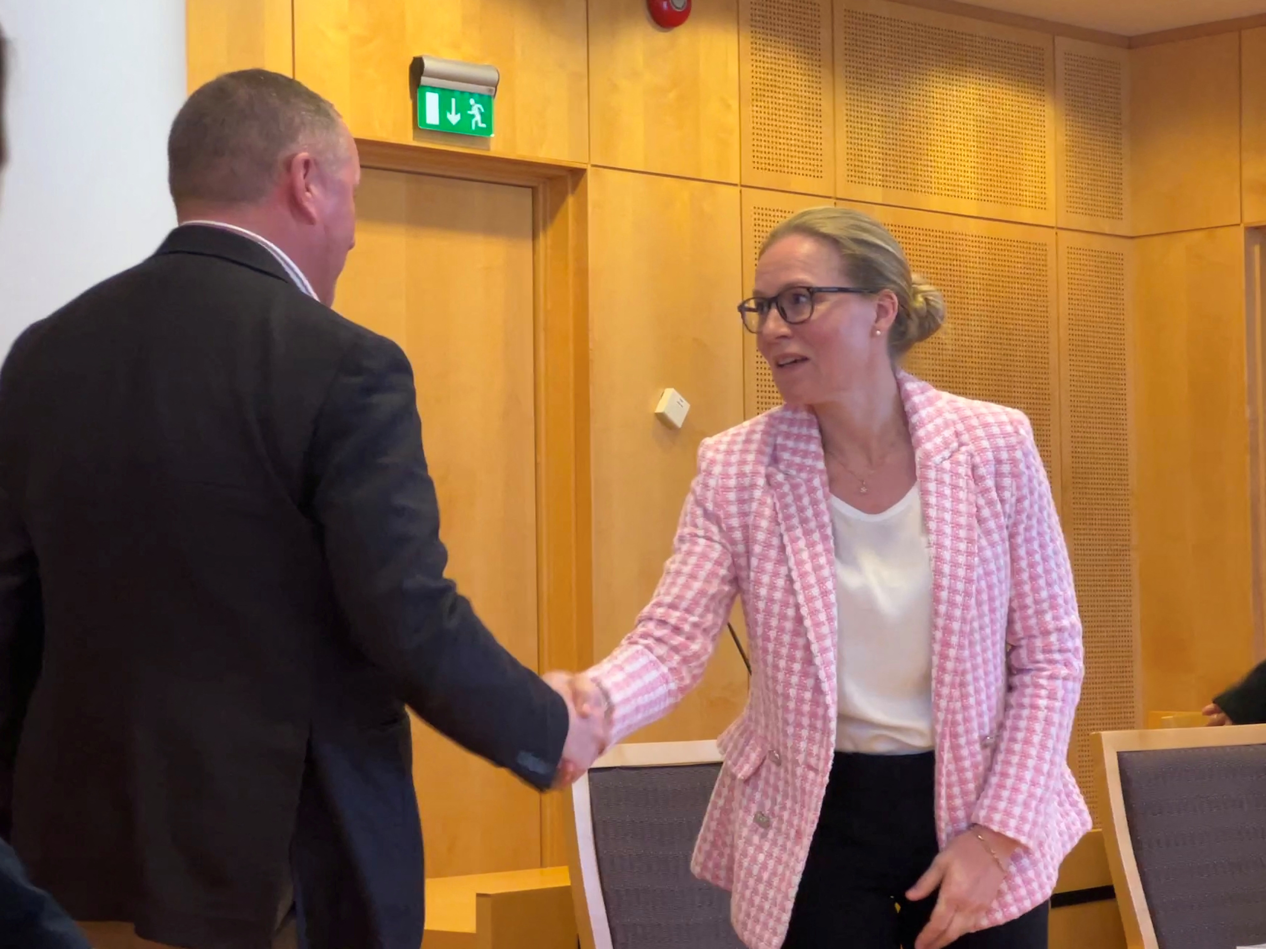Norway wealth fund CEO Nicolai Tangen and fund employee Elisabeth Bull Daae meet in court in Oslo
