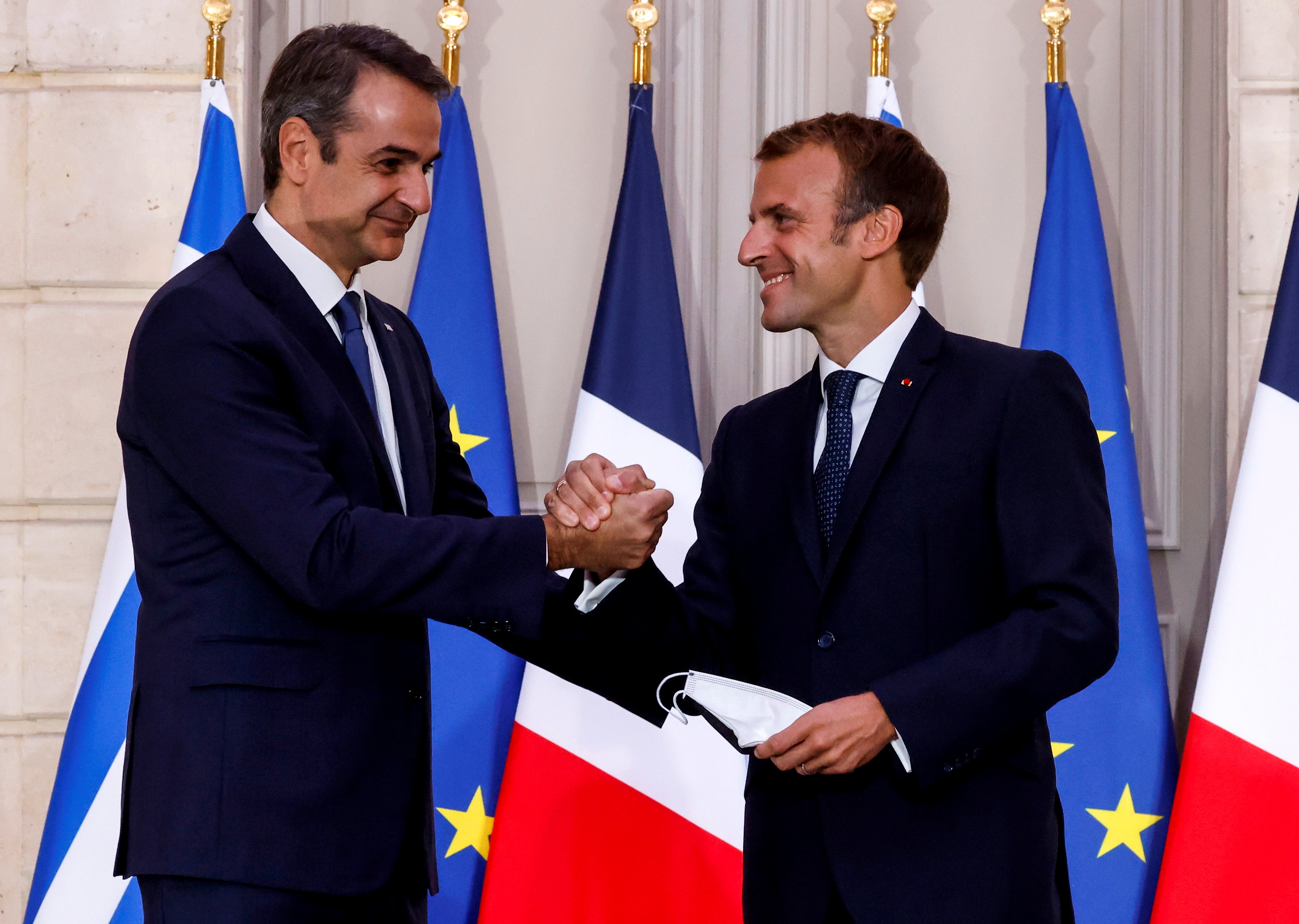 France's President Macron meets Greek Prime Minister Kyriakos at the Elysee Palace in Paris