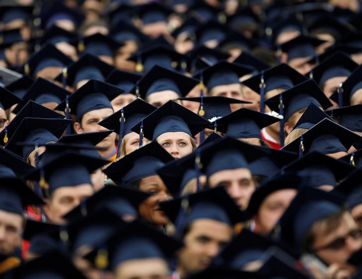 Graduates wait for the start of commencement exercises at Liberty University in Lynchburg, Virginia